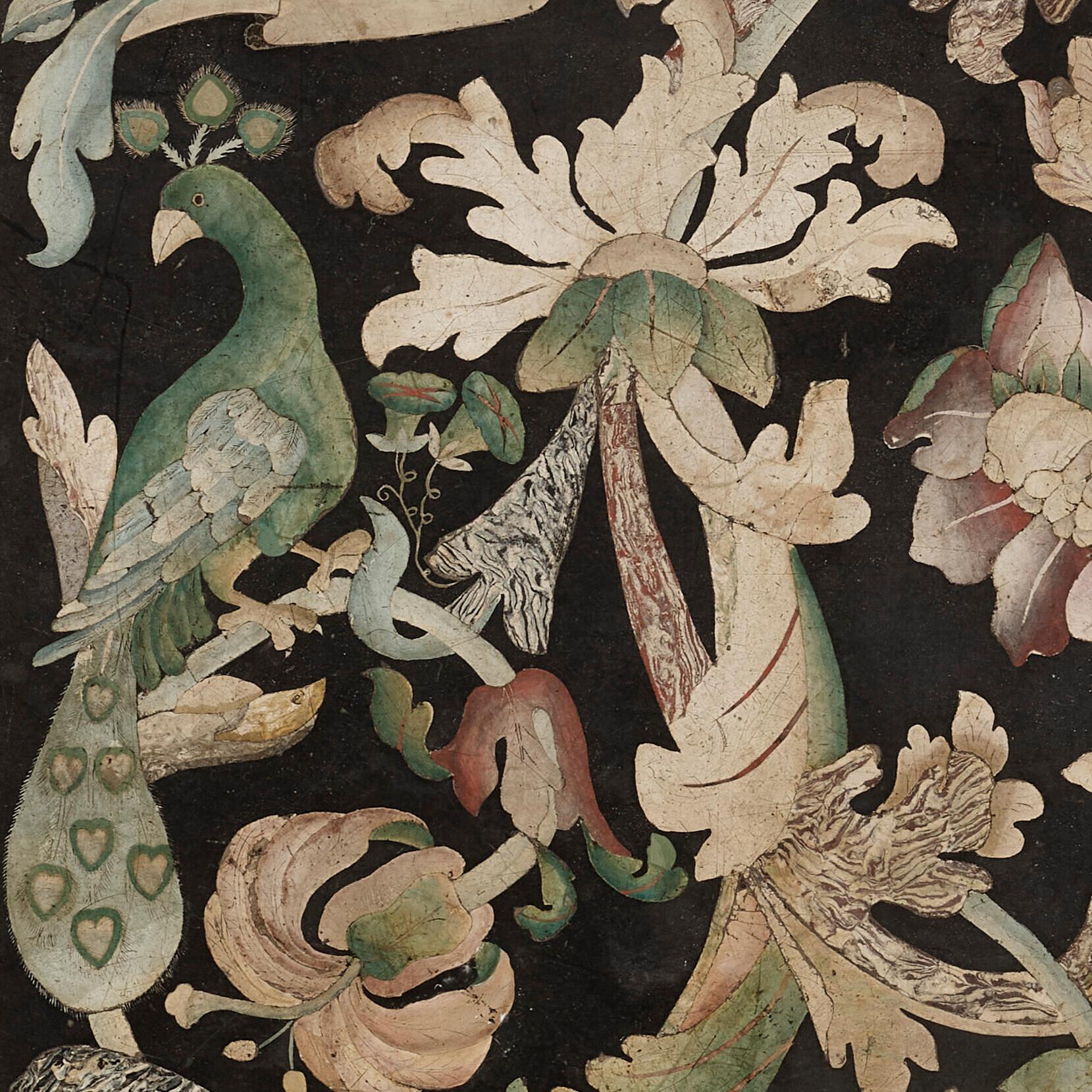 A Very Rare and Incredible 17/18 (1600-1700's) C. North Italian Scagliola Panel with Parrots, Peacocks, Flowers, Vines, and More.  A central roundel depicting a kneeling monk presenting a lily serves as the focal point of this North Italian