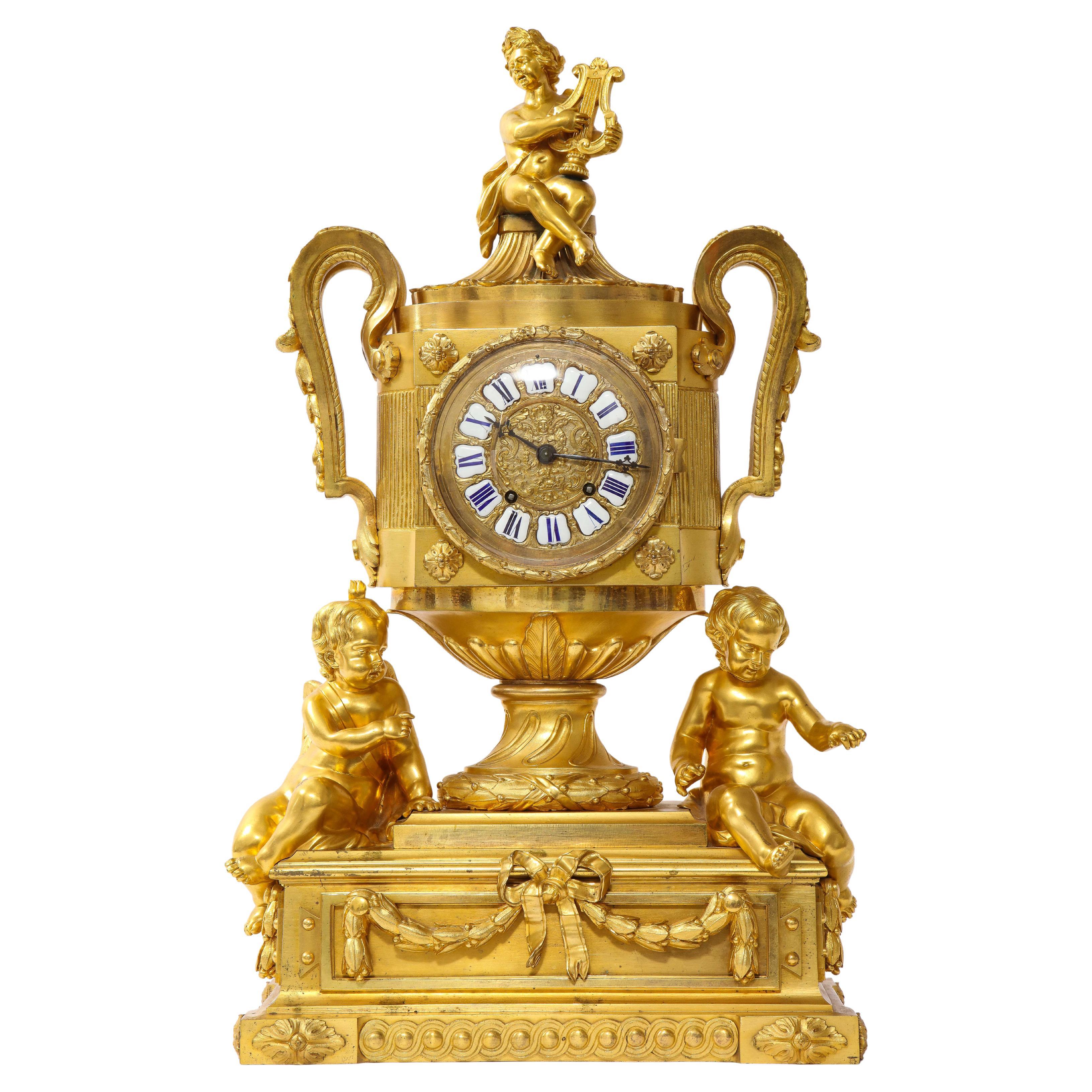A Rare 18th C. French Dore Bronze Clock w/ Putti & Musician, Att. Robert Osmond