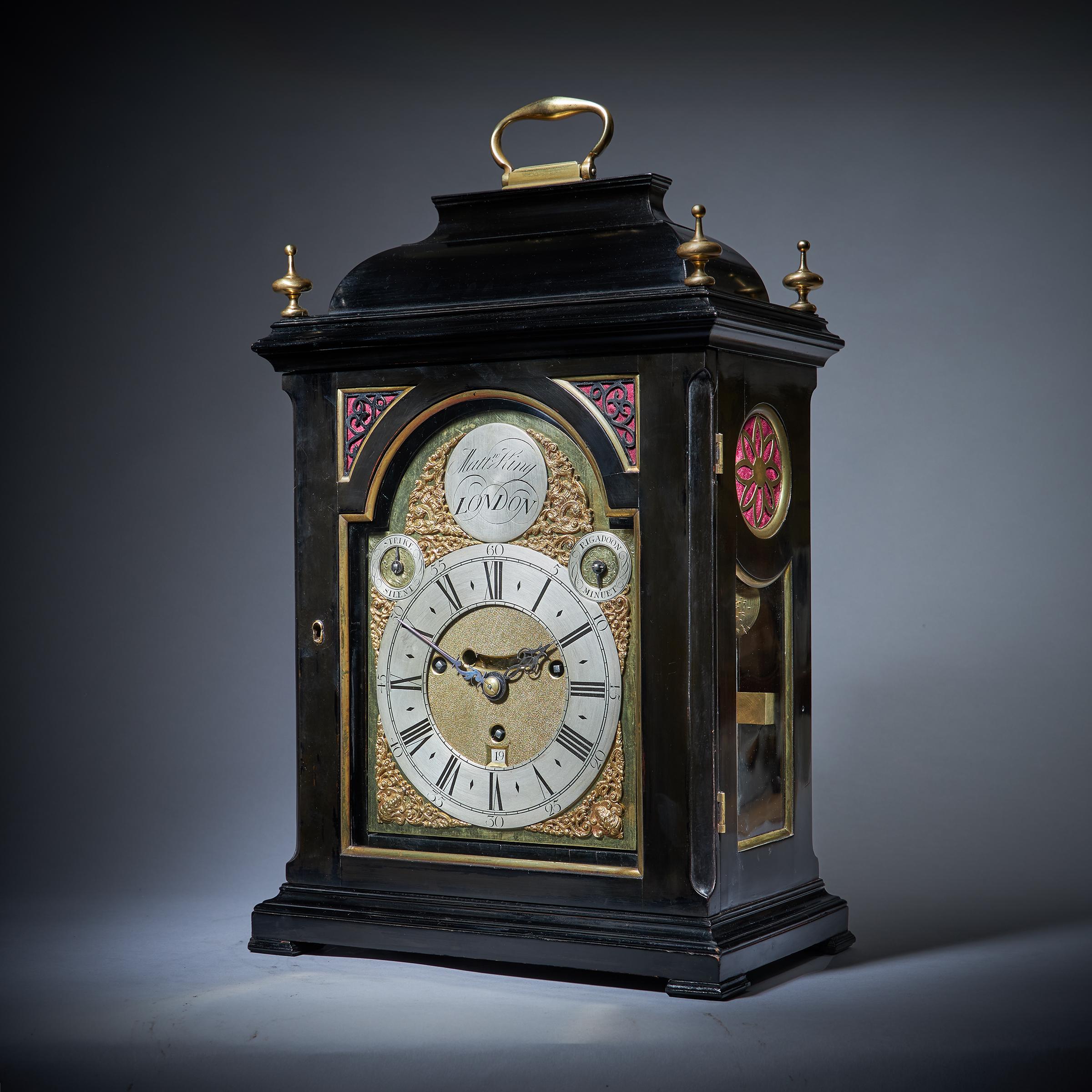 A rare George II musical table clock by Matthew King, circa 1735.

This unusual eight-day spring-driven table clock was made by Matthew King, who was active as a clockmaker in the second quarter of the 18th century. 
The impressive five knopped