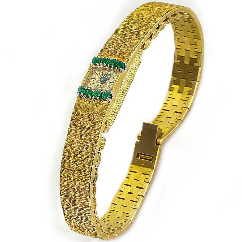 Round Cut 1970s Piaget Emerald 18 Karat Yellow Gold Line Bracelet Watch For Sale