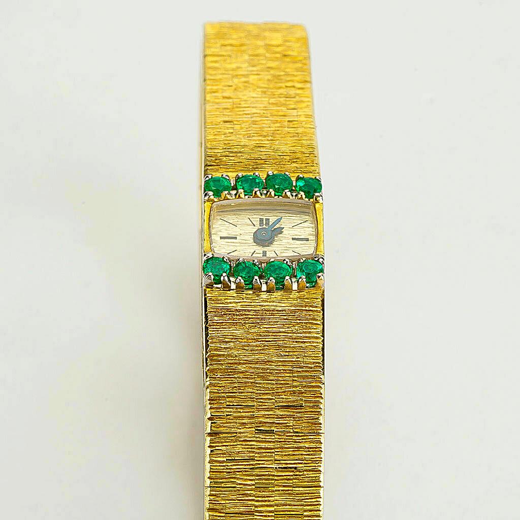 1970s Piaget Emerald 18 Karat Yellow Gold Line Bracelet Watch For Sale 2