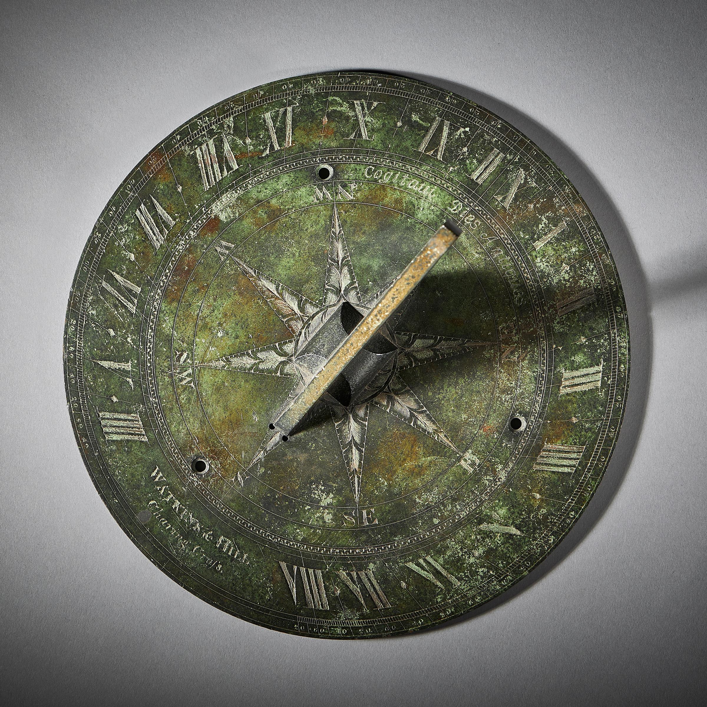 A beautifully weathered circular bronze sundial by Watkins & Hill, first half of the 19th century. The sundial was designed and calibrated to be used outside on a stone base in a garden in Southern England. 

The engraved base plate, which has a