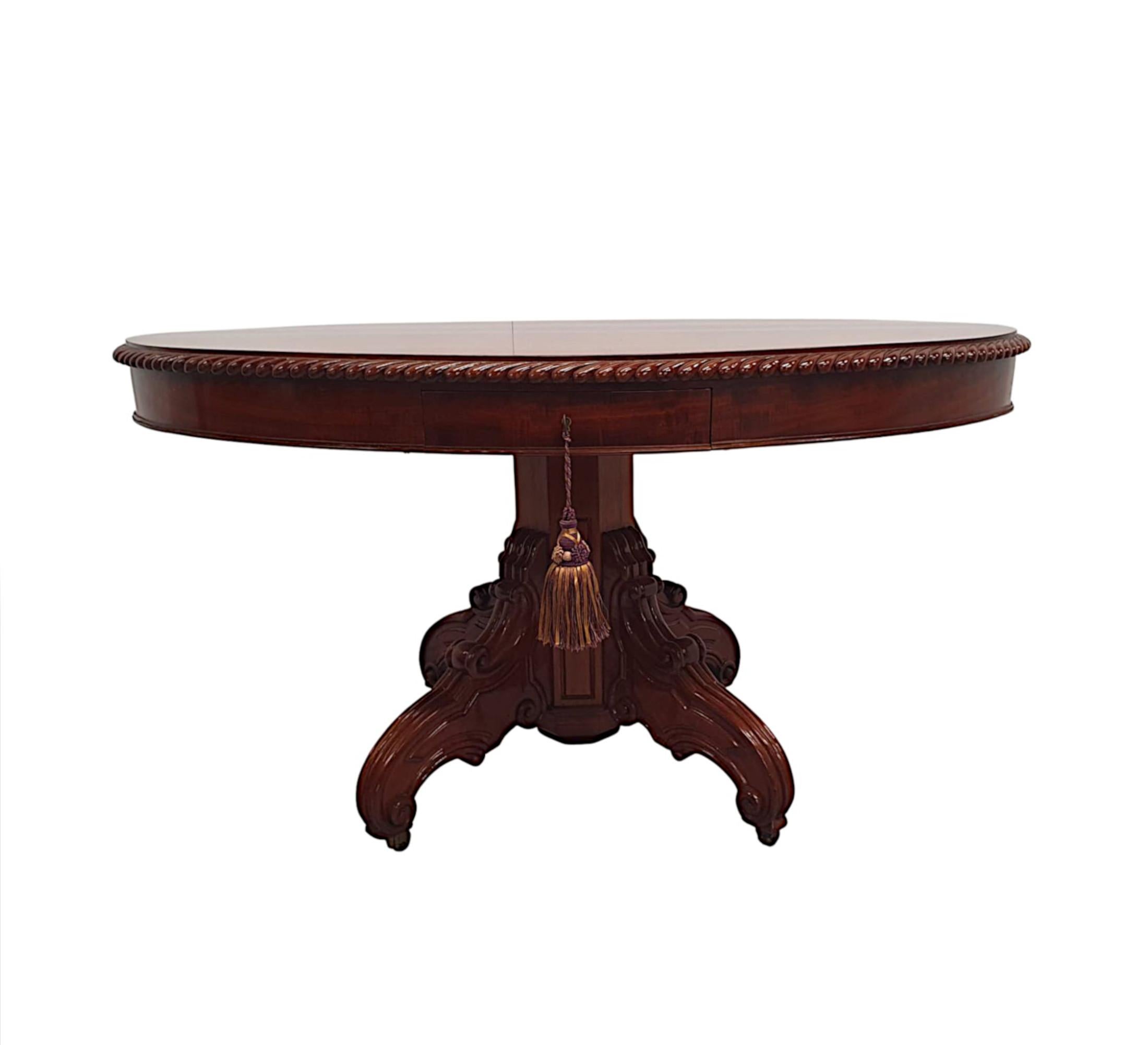 English A Rare 19th Century Figured Mahogany Oval Drum Table  For Sale