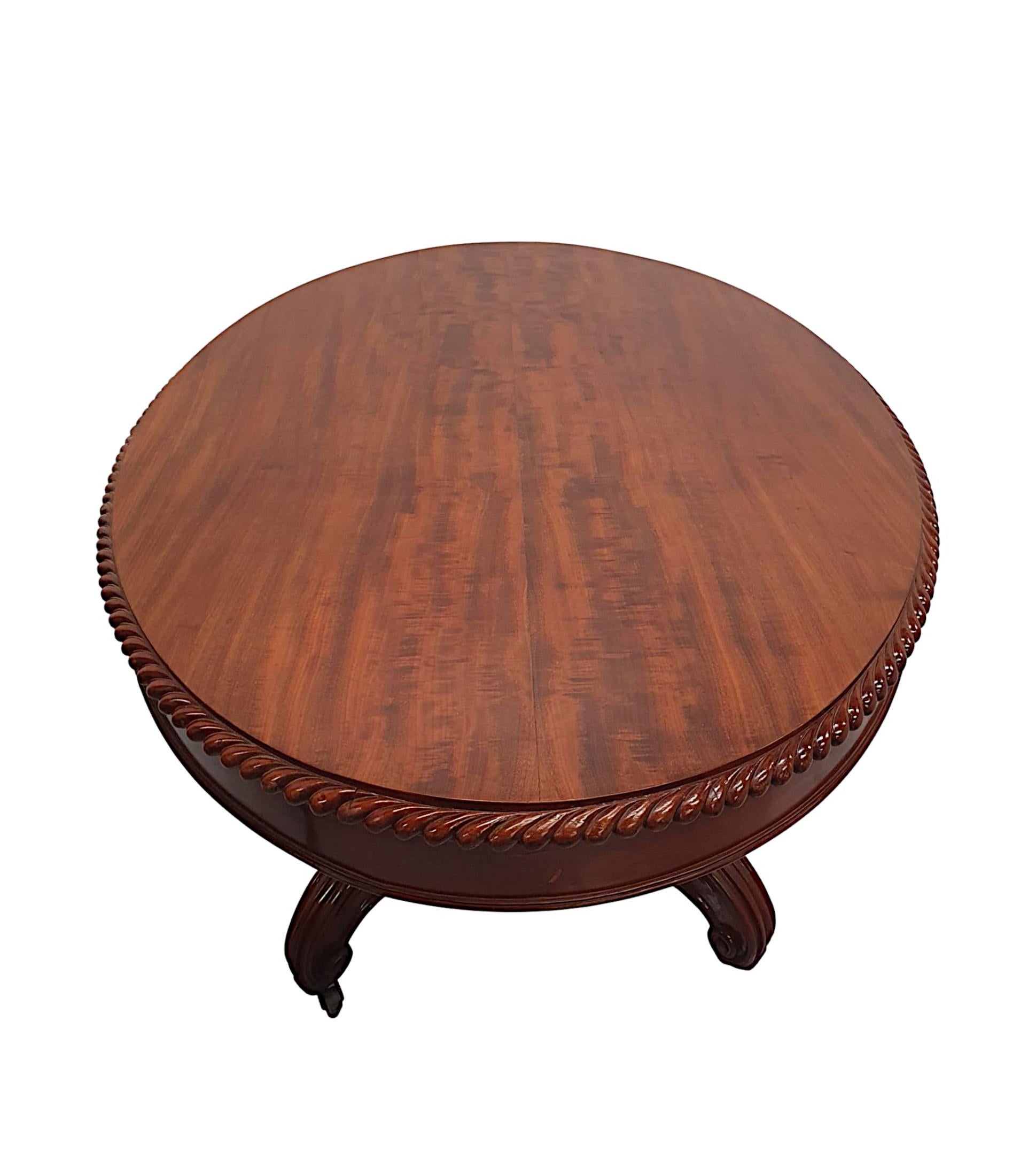 Brass A Rare 19th Century Figured Mahogany Oval Drum Table  For Sale
