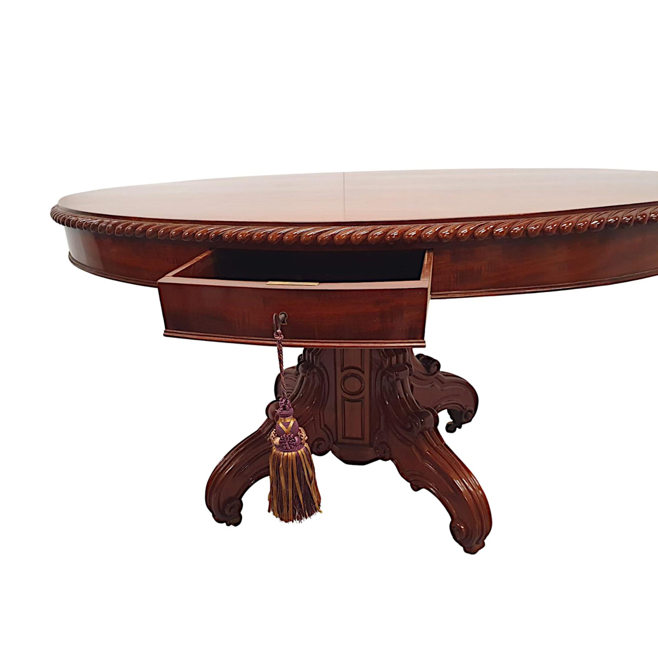 A Rare 19th Century Figured Mahogany Oval Drum Table  For Sale 1