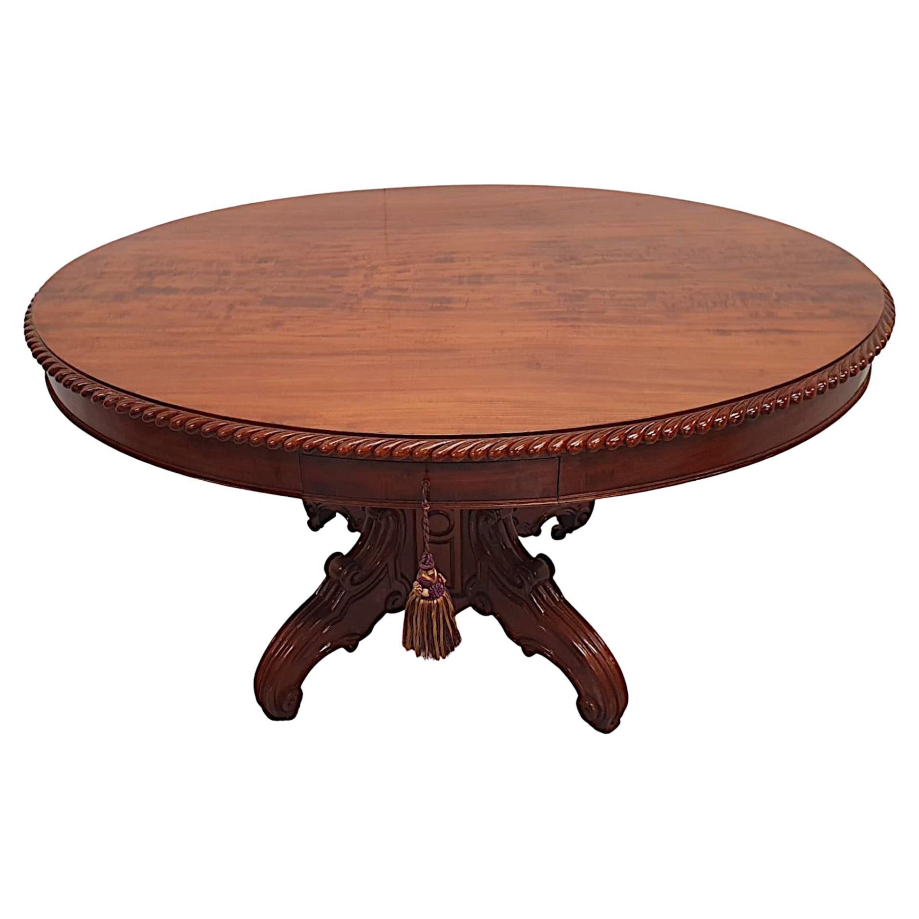 A Rare 19th Century Figured Mahogany Oval Drum Table  For Sale