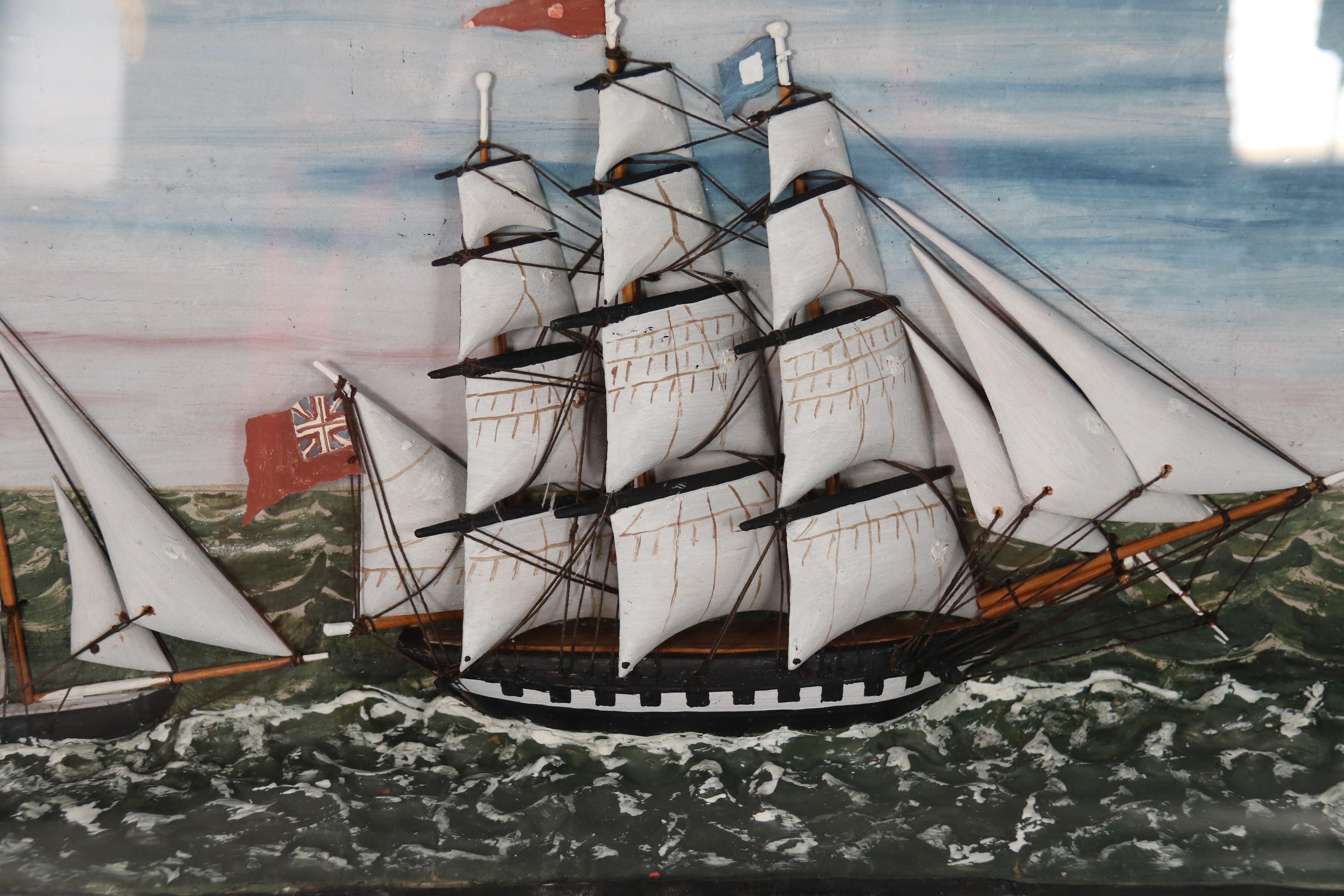 19th Century A rare 19th century folk art diorama of two sailing vessels racing at sea. For Sale