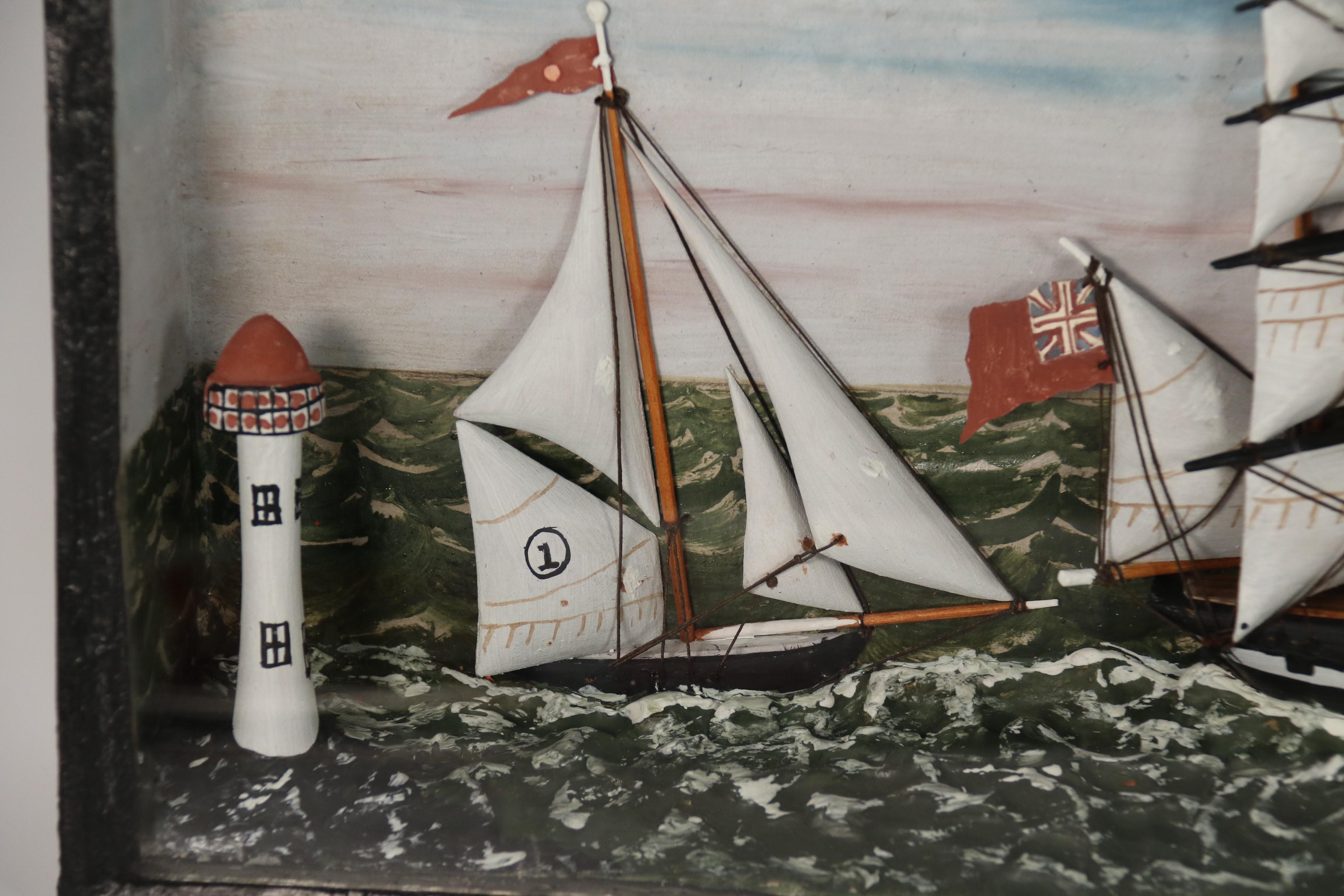 Other A rare 19th century folk art diorama of two sailing vessels racing at sea. For Sale