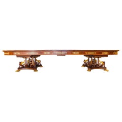 A rare 19th century French Empire gilt bronze mounted mahogany dining table
