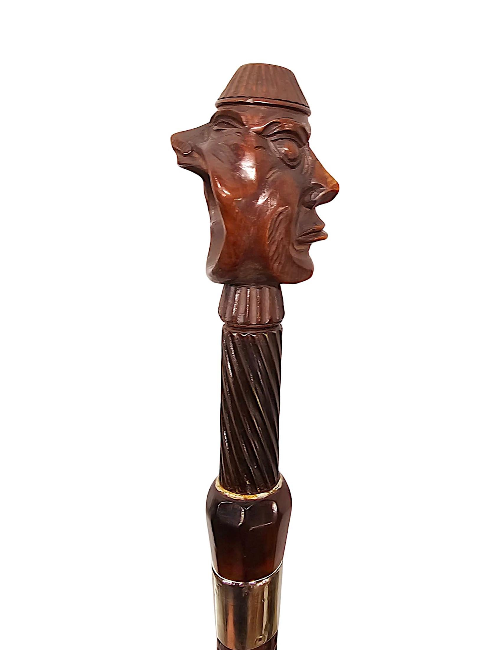 XIXe siècle Rare canne casse-noix du 19e siècle avec une paire de têtes sculptées en vente