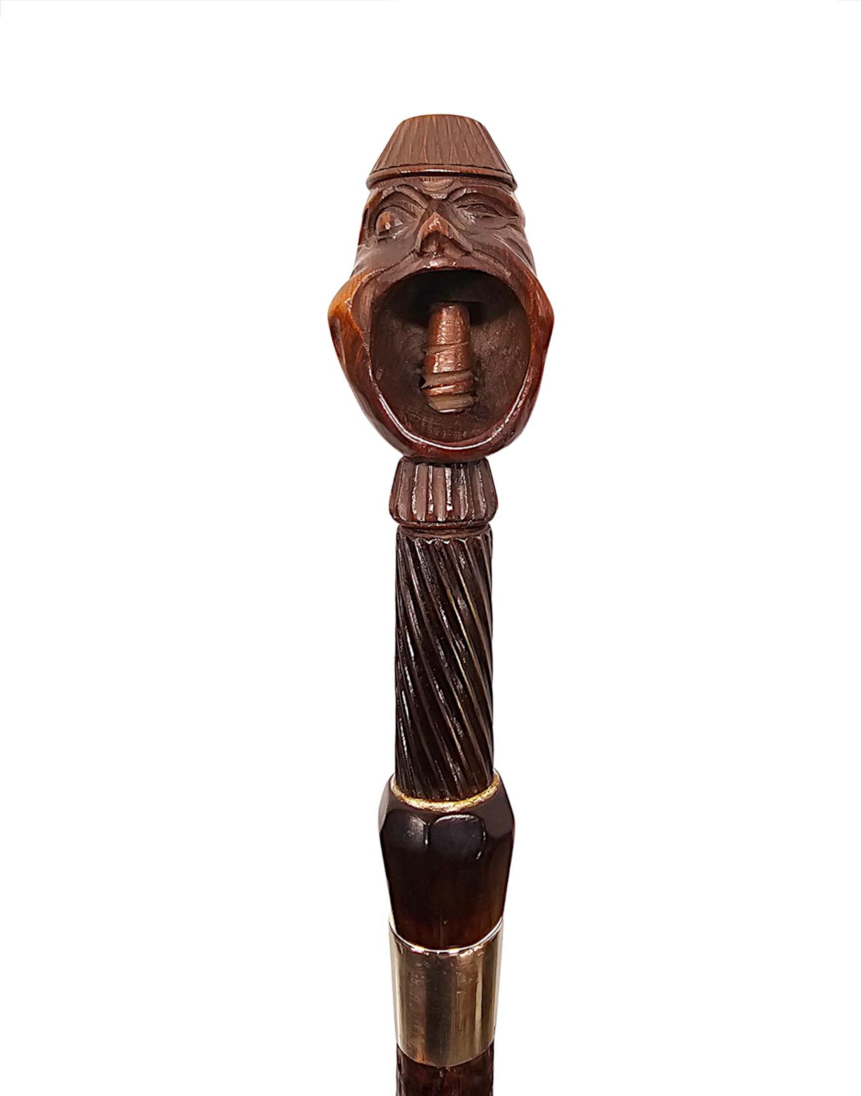 Argent Rare canne casse-noix du 19e siècle avec une paire de têtes sculptées en vente
