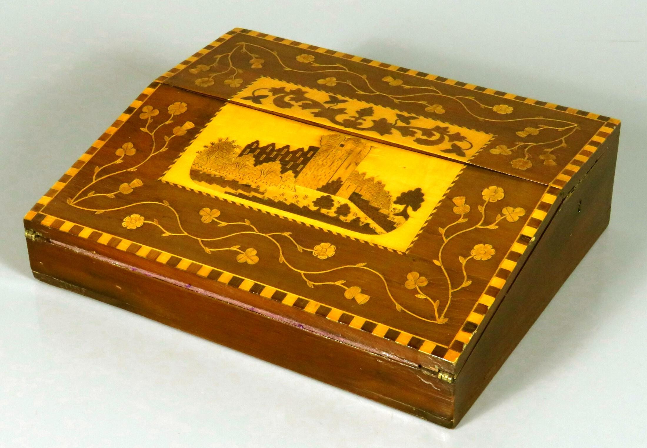 A very handsome & relatively rare Killarney Ware marquetry writing slope / lap desk, the yew wood case is constructed with two fold-over panels decorated with marquetry inlays of arbutus (an indigenous wood species found in and around Killarney)