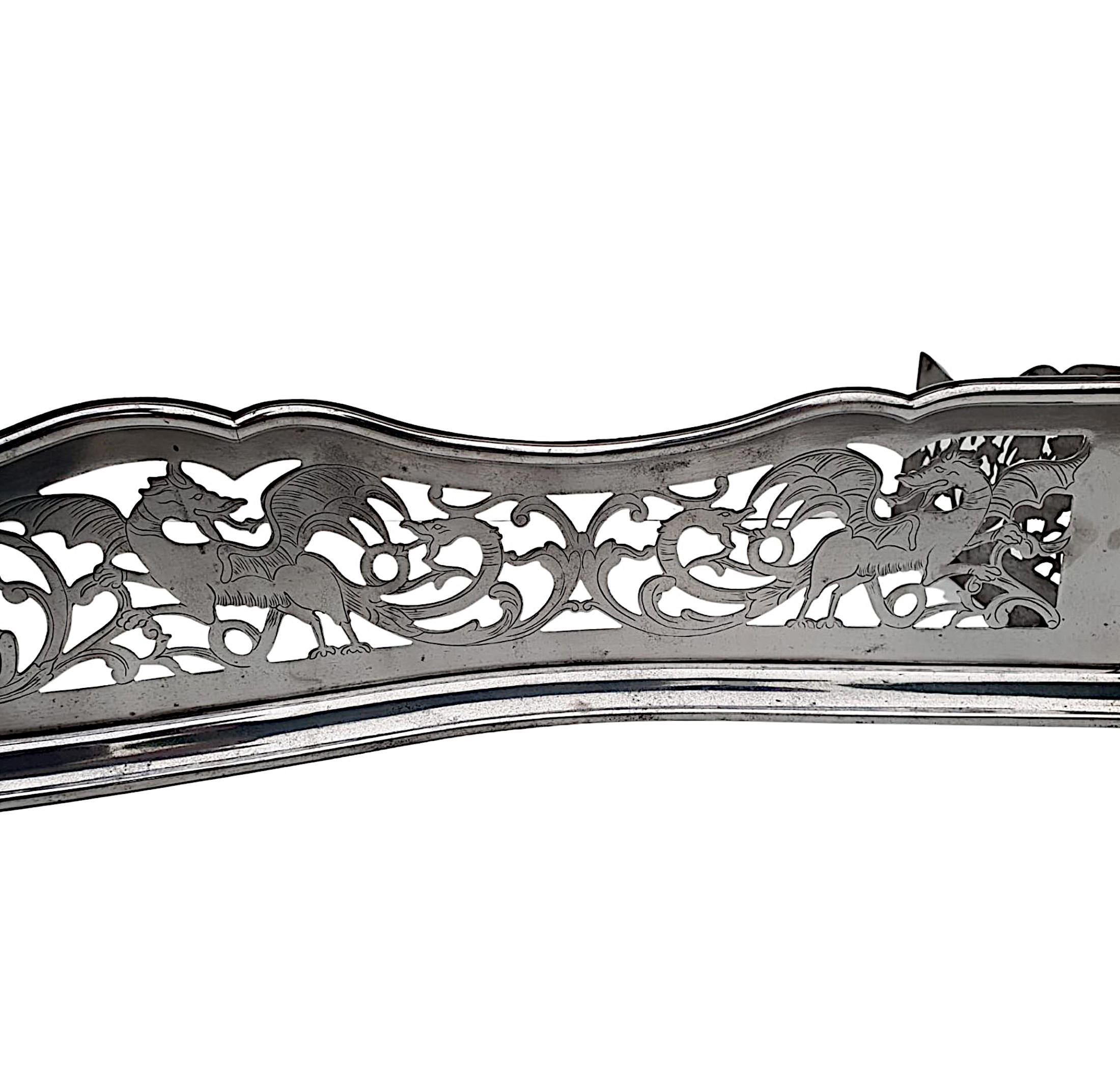 Rare 19th Century Polished Steel Fender with Flower and Dragon Detail For Sale 1