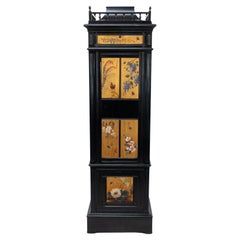 A rare Aesthetic Movement ebonized polychrome painted humidor with floral decor