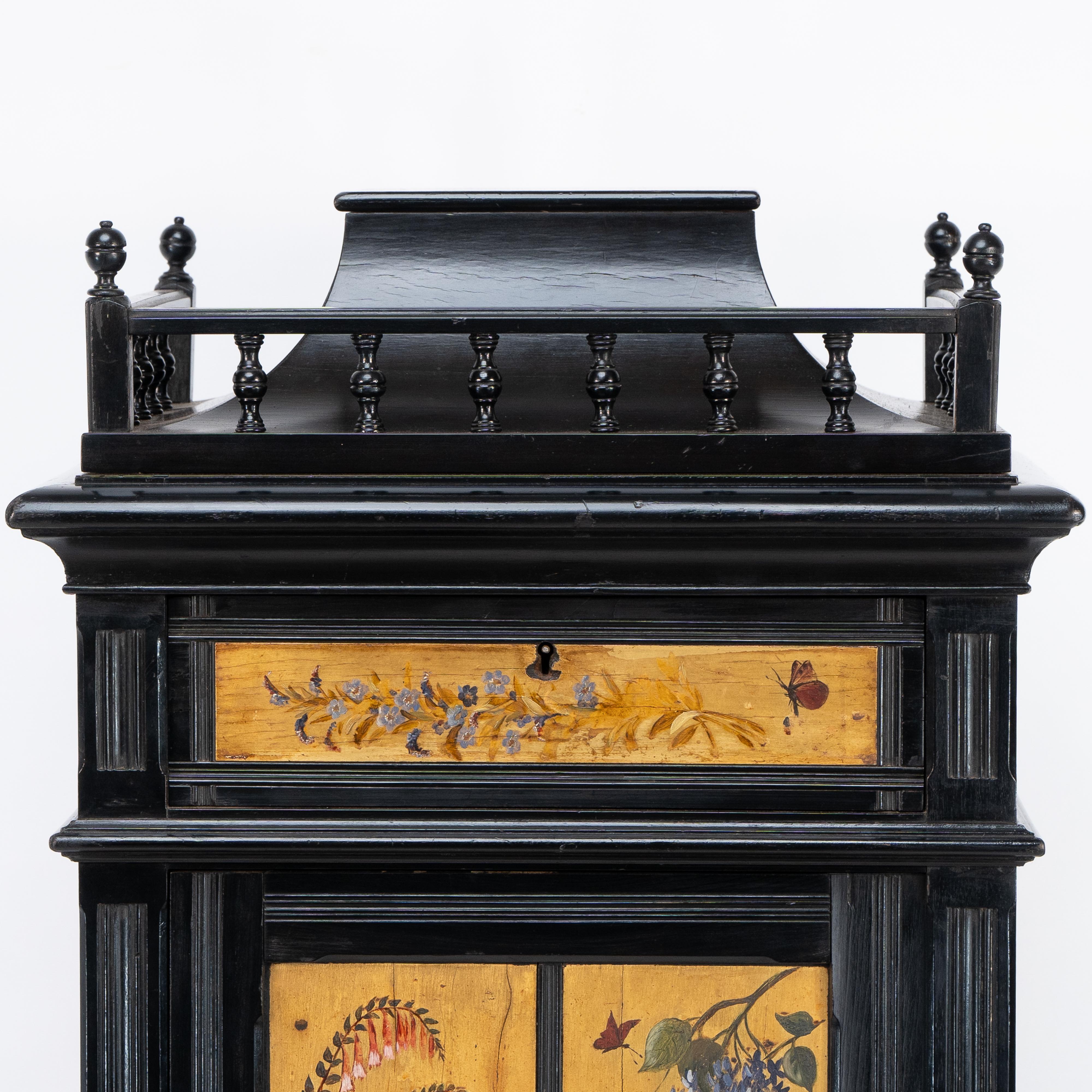 Walnut A rare Aesthetic Movement ebonized polychrome painted humidor with floral decor For Sale