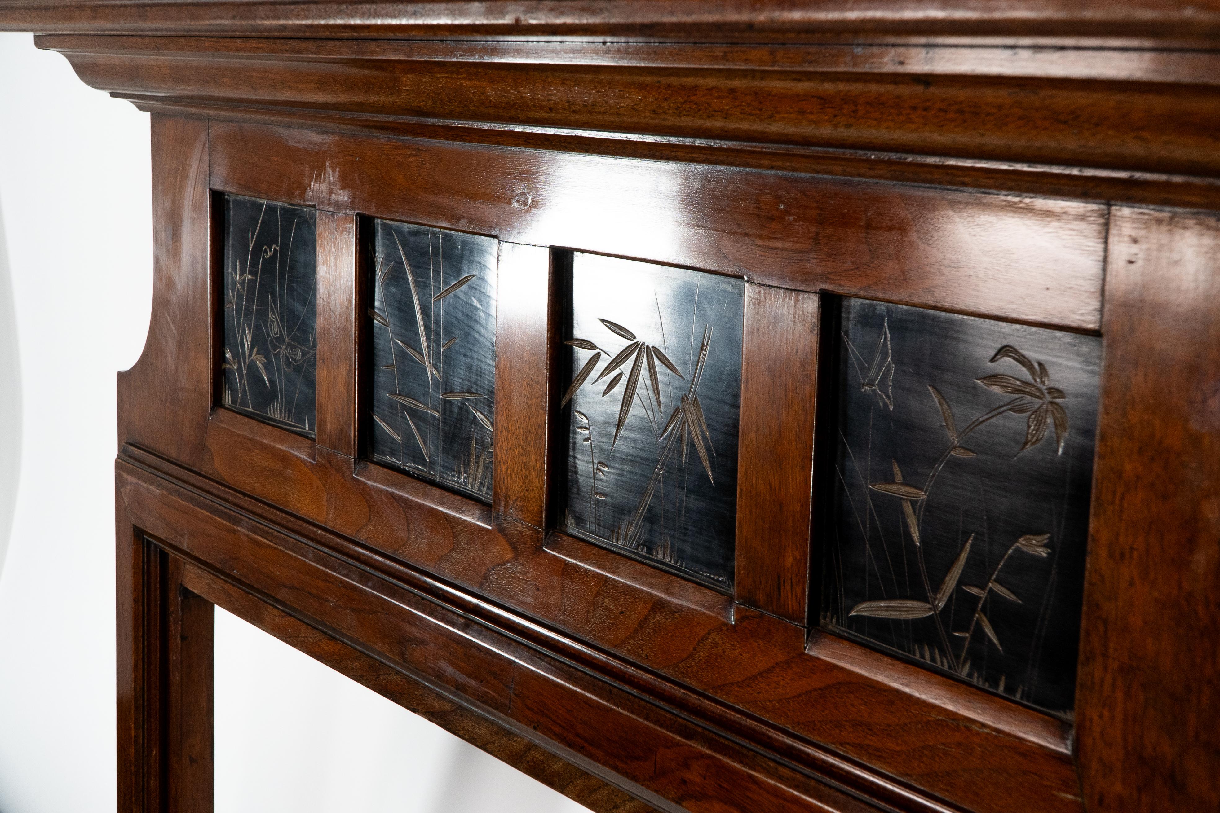 Late 19th Century Thomas Jeckyll A rare Aesthetic Movement Walnut fire surround with butterfly's For Sale