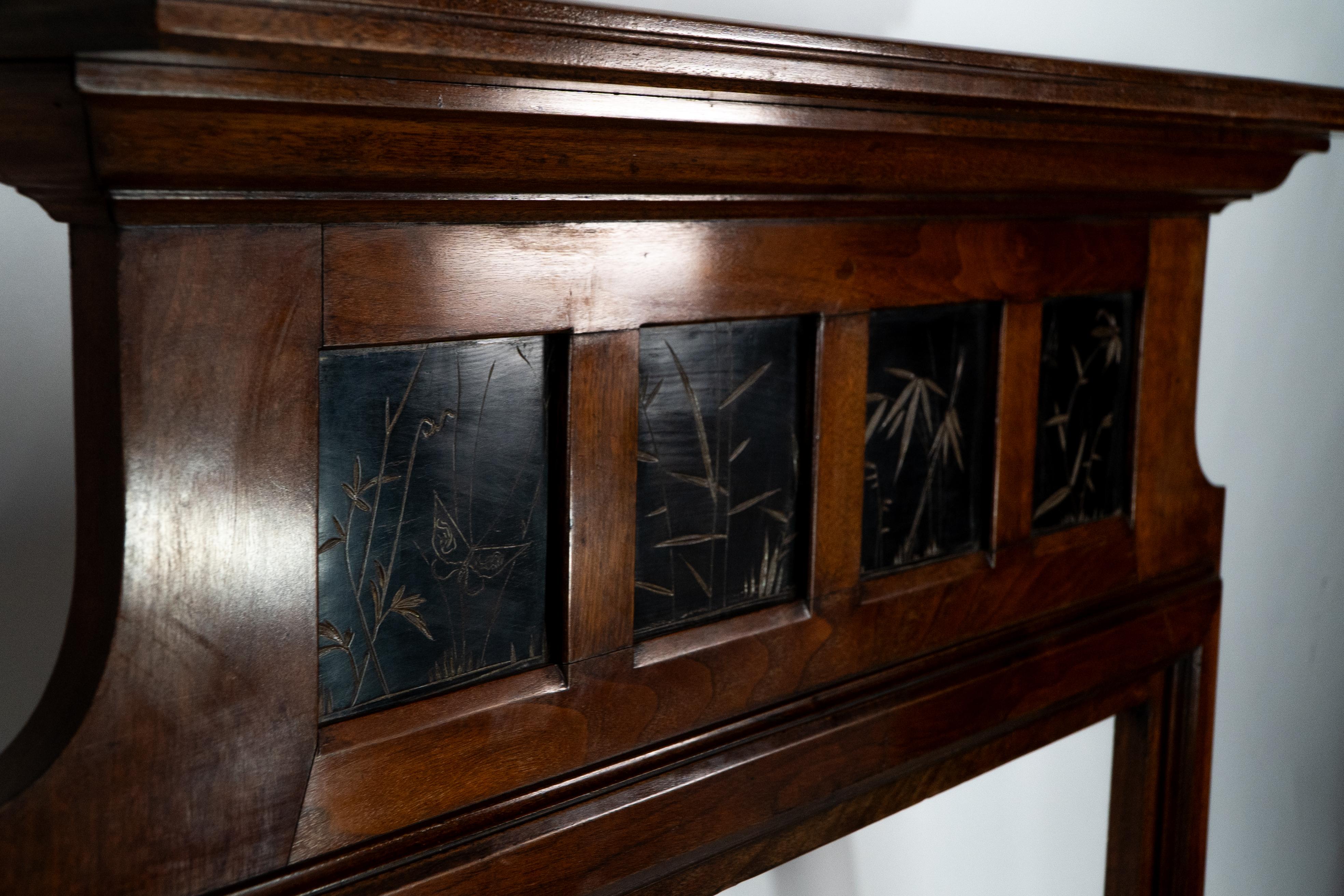 Thomas Jeckyll A rare Aesthetic Movement Walnut fire surround with butterfly's In Good Condition For Sale In London, GB