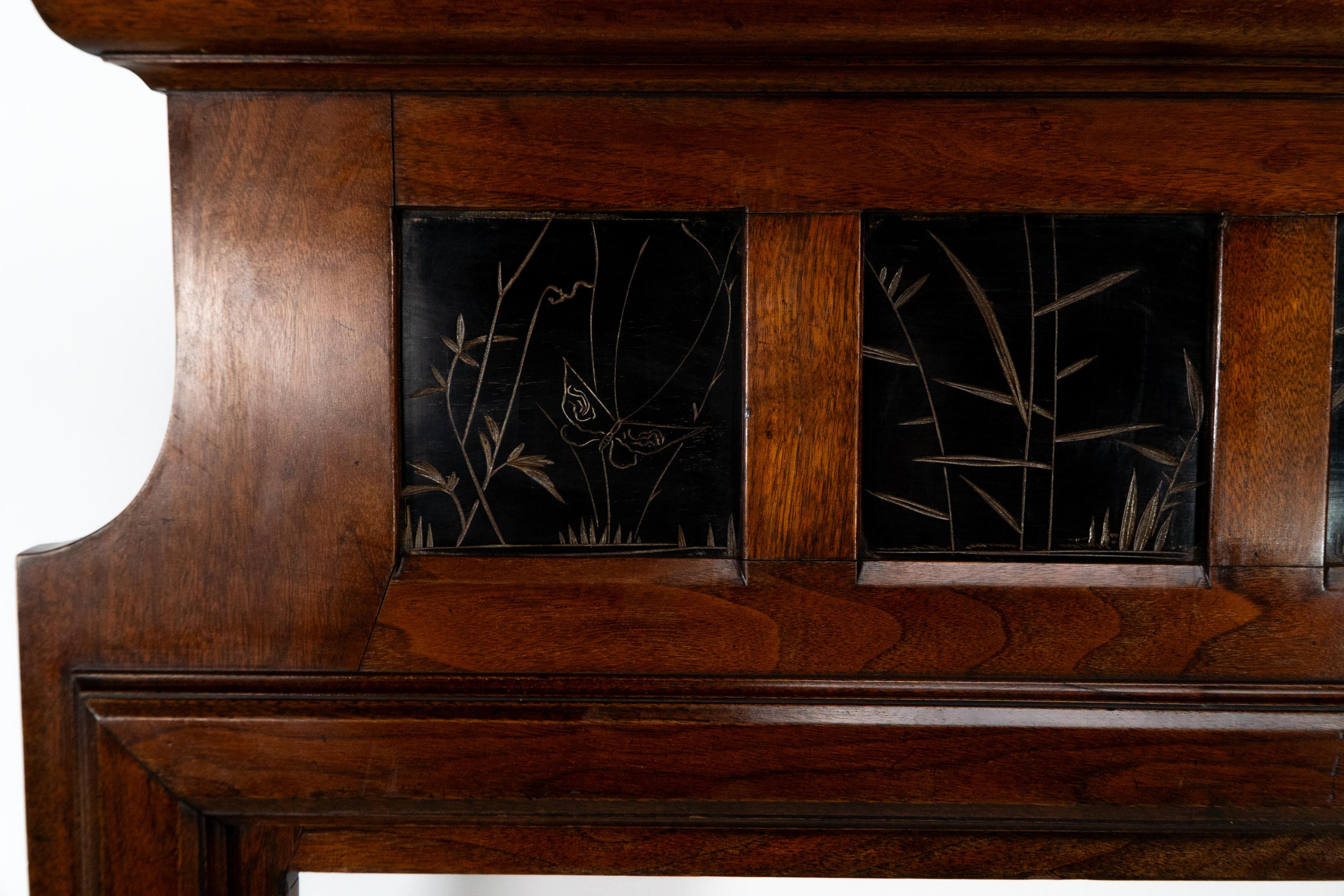 Thomas Jeckyll A rare Aesthetic Movement Walnut fire surround with butterfly's For Sale 4