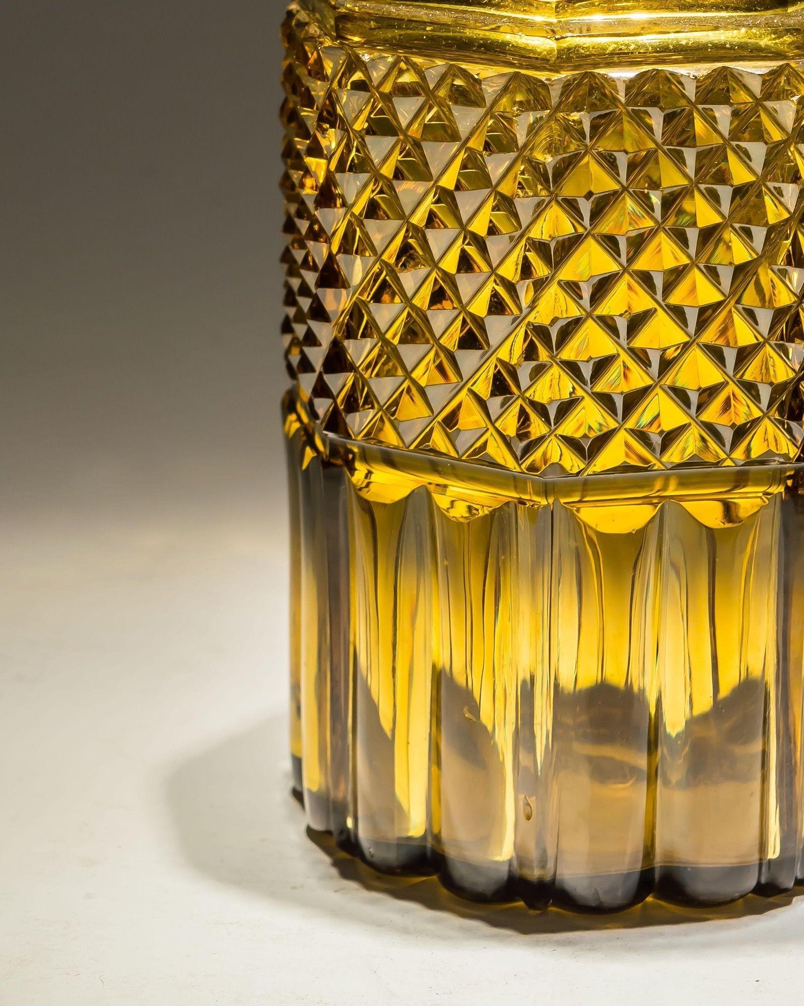 A rare Regency amber slice and diamond cut decanter.
