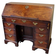 A Rare And Early Georgian Kneehole Bureau