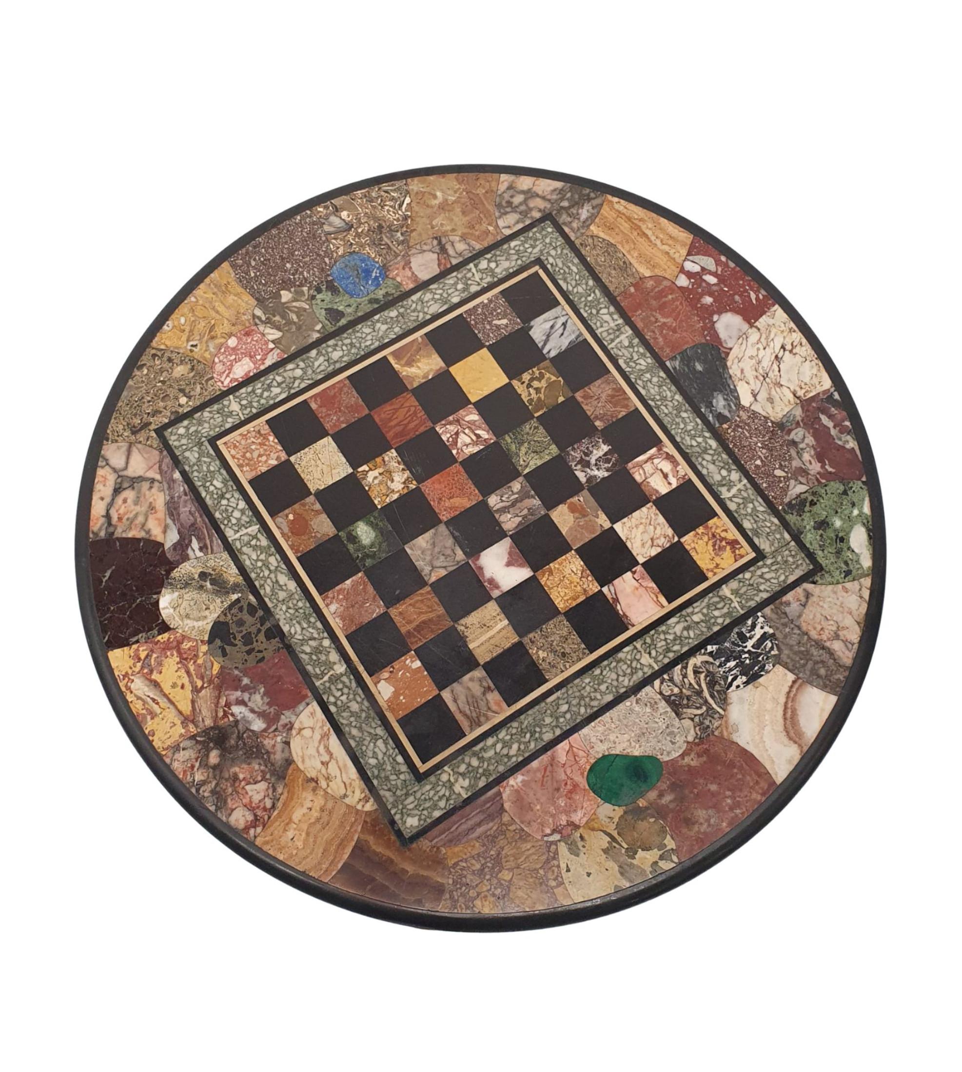 An exceptionally rare and fine 19th century marble top centre table of circu-lar form, the stunning micro mosaic marble top with chess board to the cen-tral reserve is inset with fabulous examples of marbles comprising of Sienna, Pietro Gray, Rojo