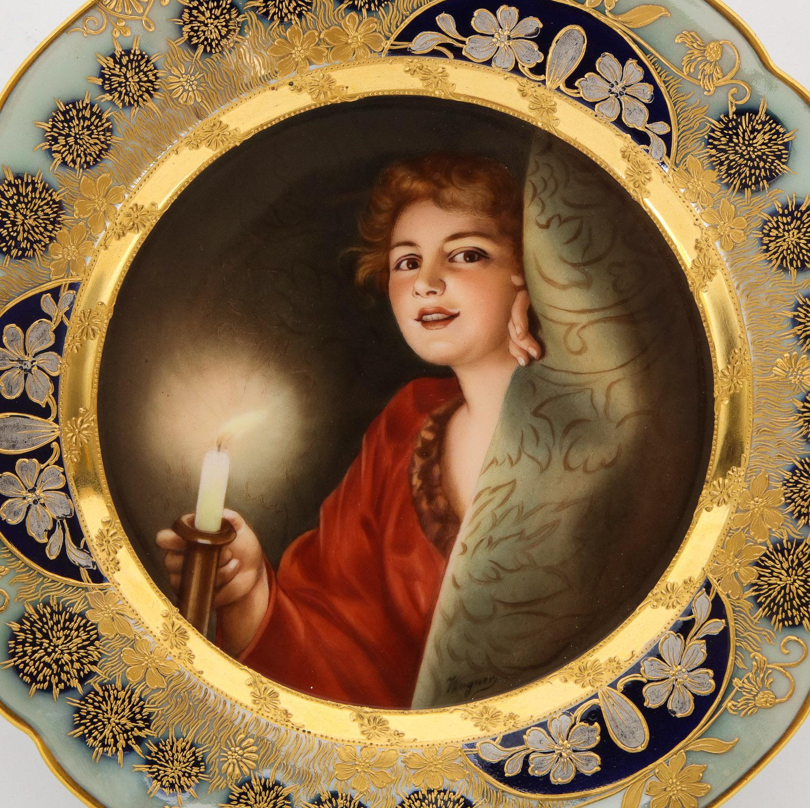 A rare and exceptional Art Nouveau Royal Vienna porcelain plate by Wagner.

Depicting a woman with candle, in an extremely elaborate raised gold and multicolored iridescent border.

Mint condition. No chips, cracks, repairs.

Measures: 9.8”