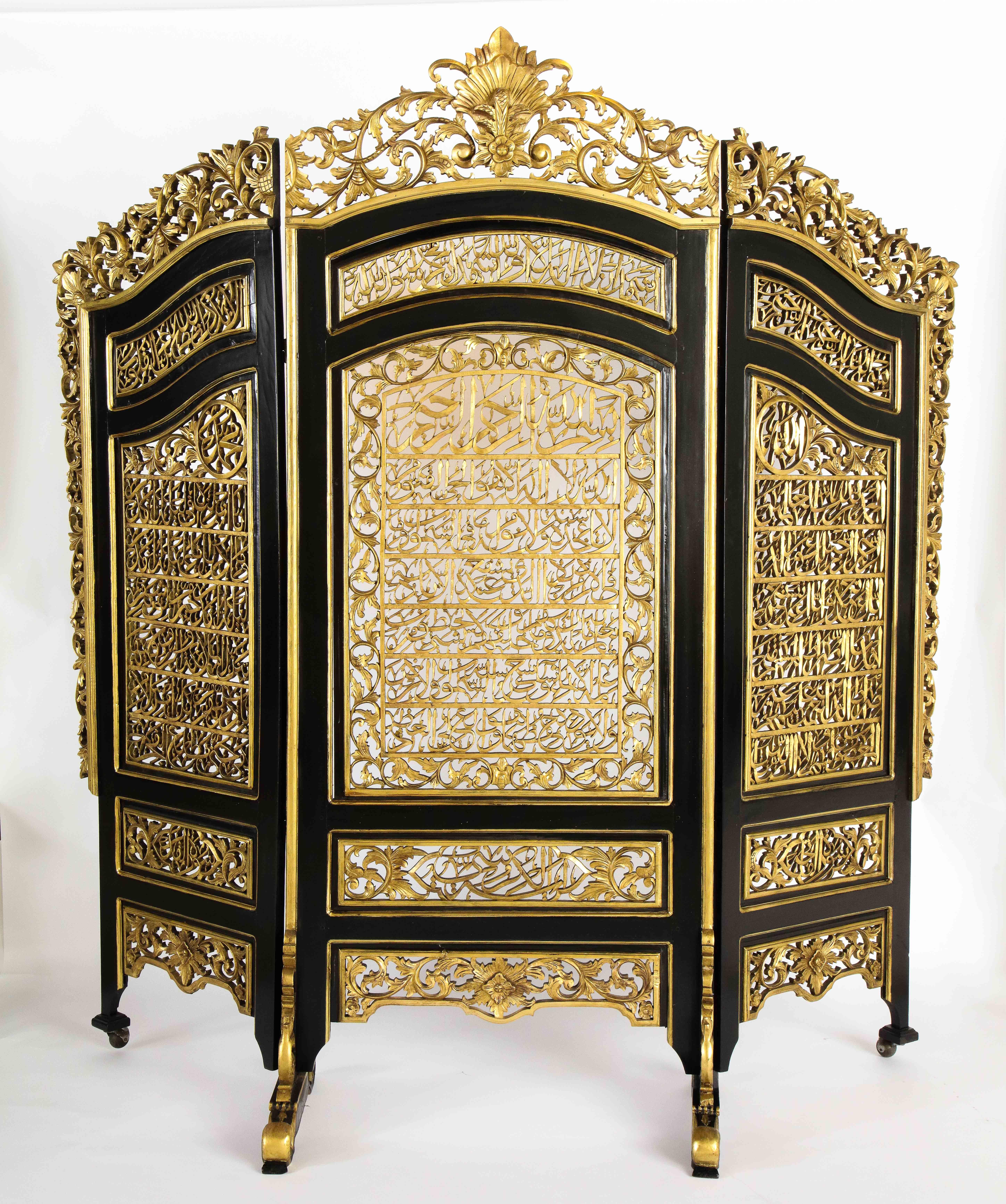 A rare, masterful, and exceptional Islamic gilt and ebonized wood three-panel screen, circa 1900.

Hand carved by a master Arabic Islamic calligrapher, this screen will make a very powerful statement in any room placed. If you are Muslim, or enjoy