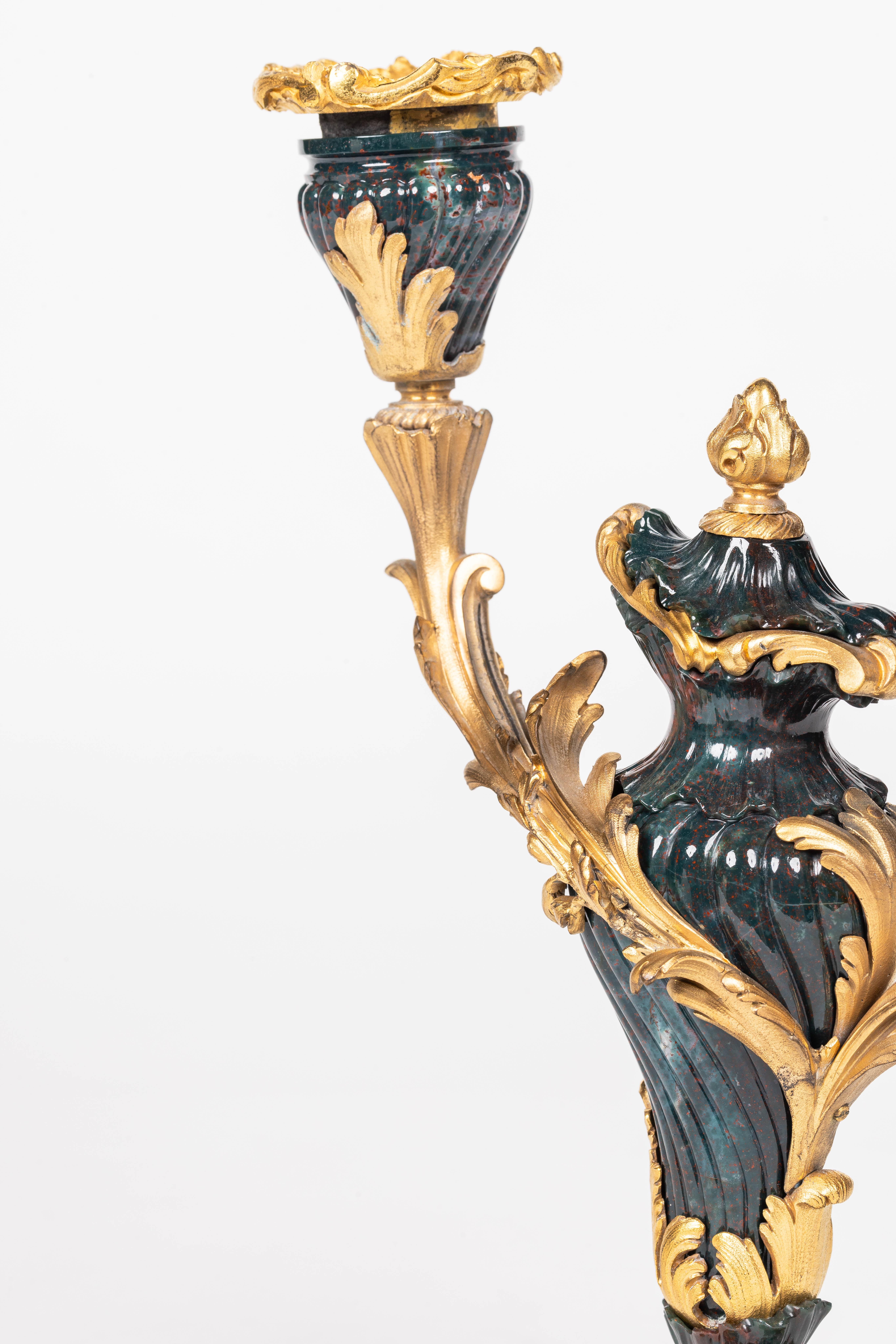 French A Rare and Exquisite Pair of Ormolu-Mounted Bloodstone Two-Light Candlesticks For Sale