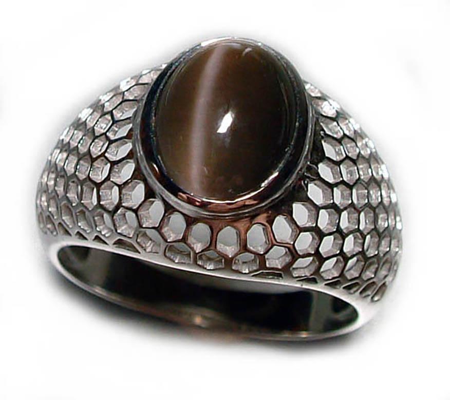 A Sillimanite Cats Eye Cabochon Silver Ring set in a stunning pentagon beehive dome band. Sillimanite is an extremely rare and lesser-known collector's gem and this stunning cats eye cabochon is the centerpiece of this amazing band. This is truly a