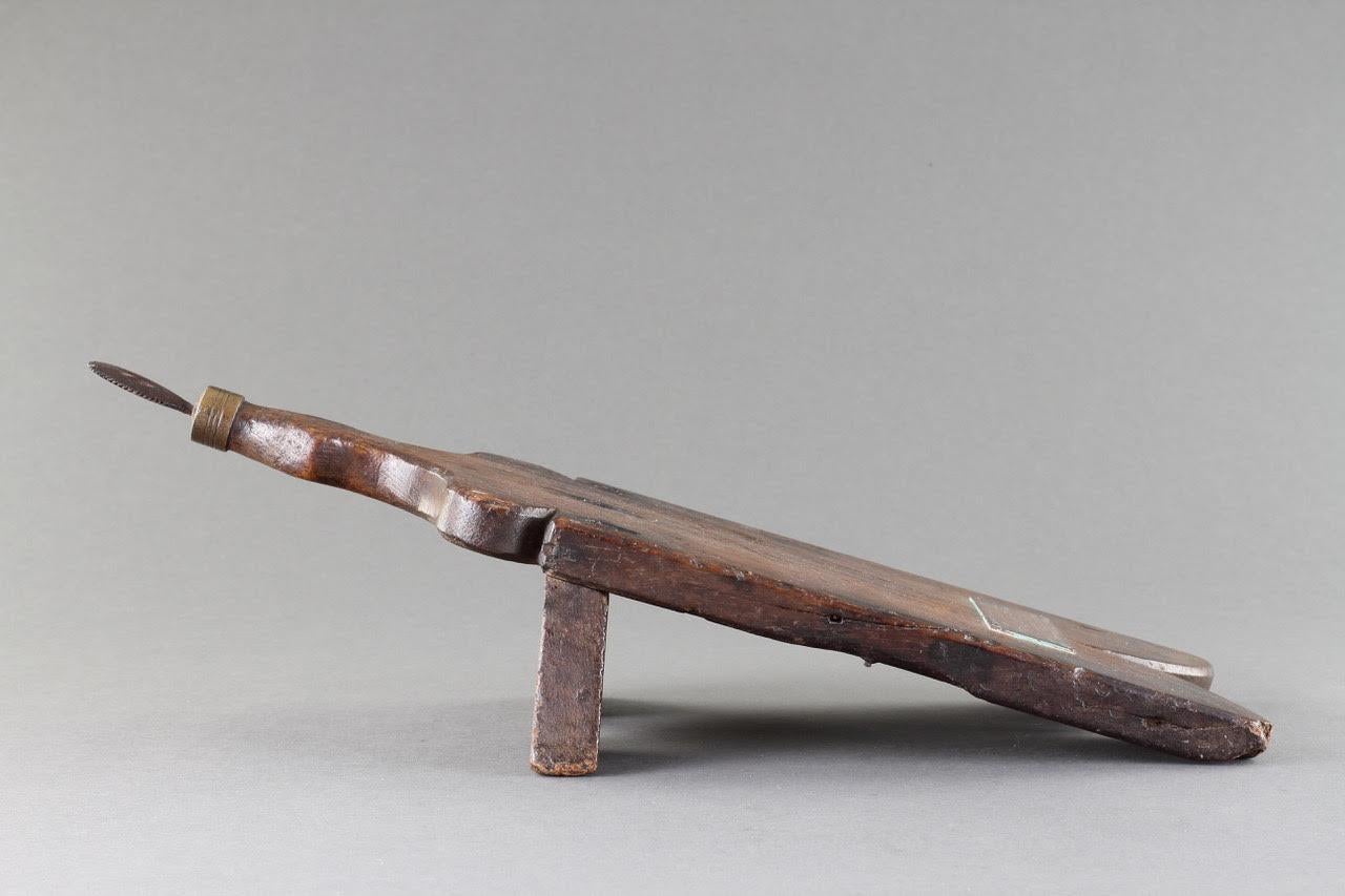 A Rare and Historically Important Artefact Recovered from HMS Adventure in 1775 after Captain James Cook’s Second Voyage to the Pacific 

A ‘coconut husker’ made by a ship’s carpenter aboard HMS Adventure in the style and design of a Native