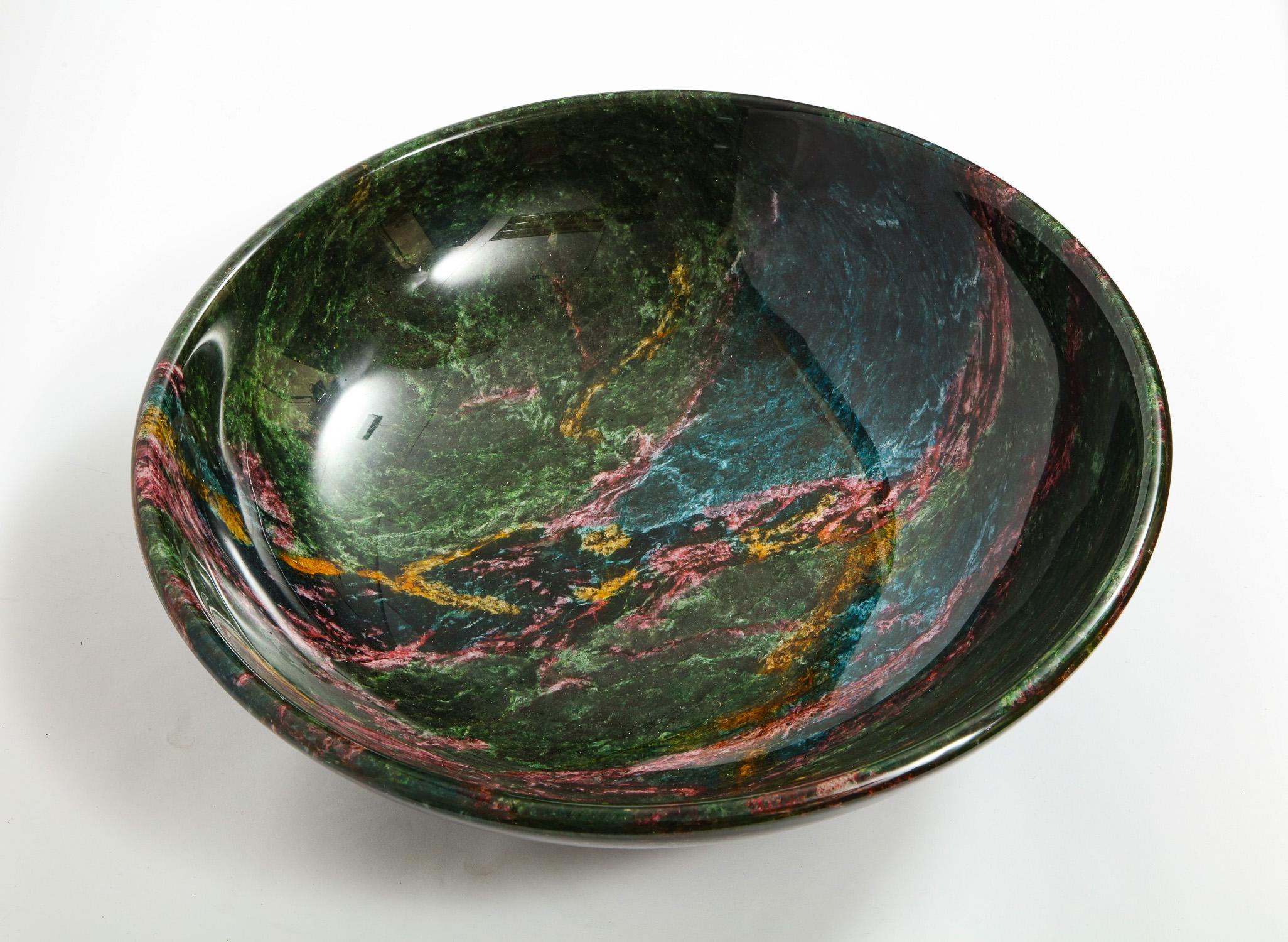 A rare and large decorative green Jasper bowl,

This green variety of jasper with red spots, known as heliotrope (bloodstone), is one of the traditional birthstones for March.

Measures: 4