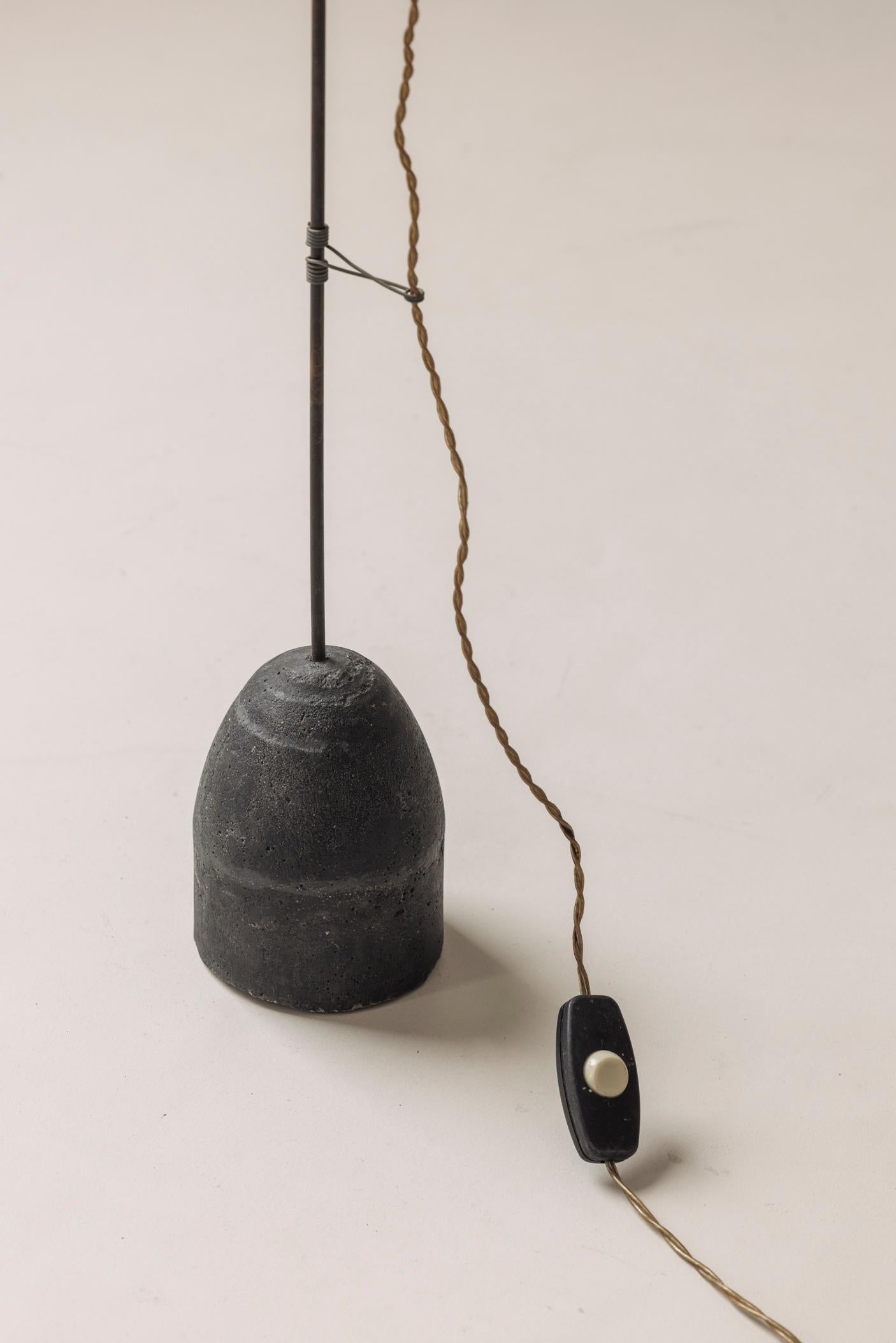 A rare and likely one-off minimal floor lamp in metal and concrete, France 1950s (Metall) im Angebot