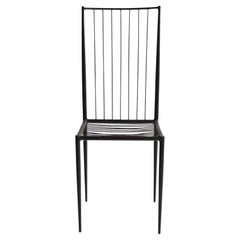 A rare and sculptural side chair by Philolaos Tloupas, executed in lacquered iro