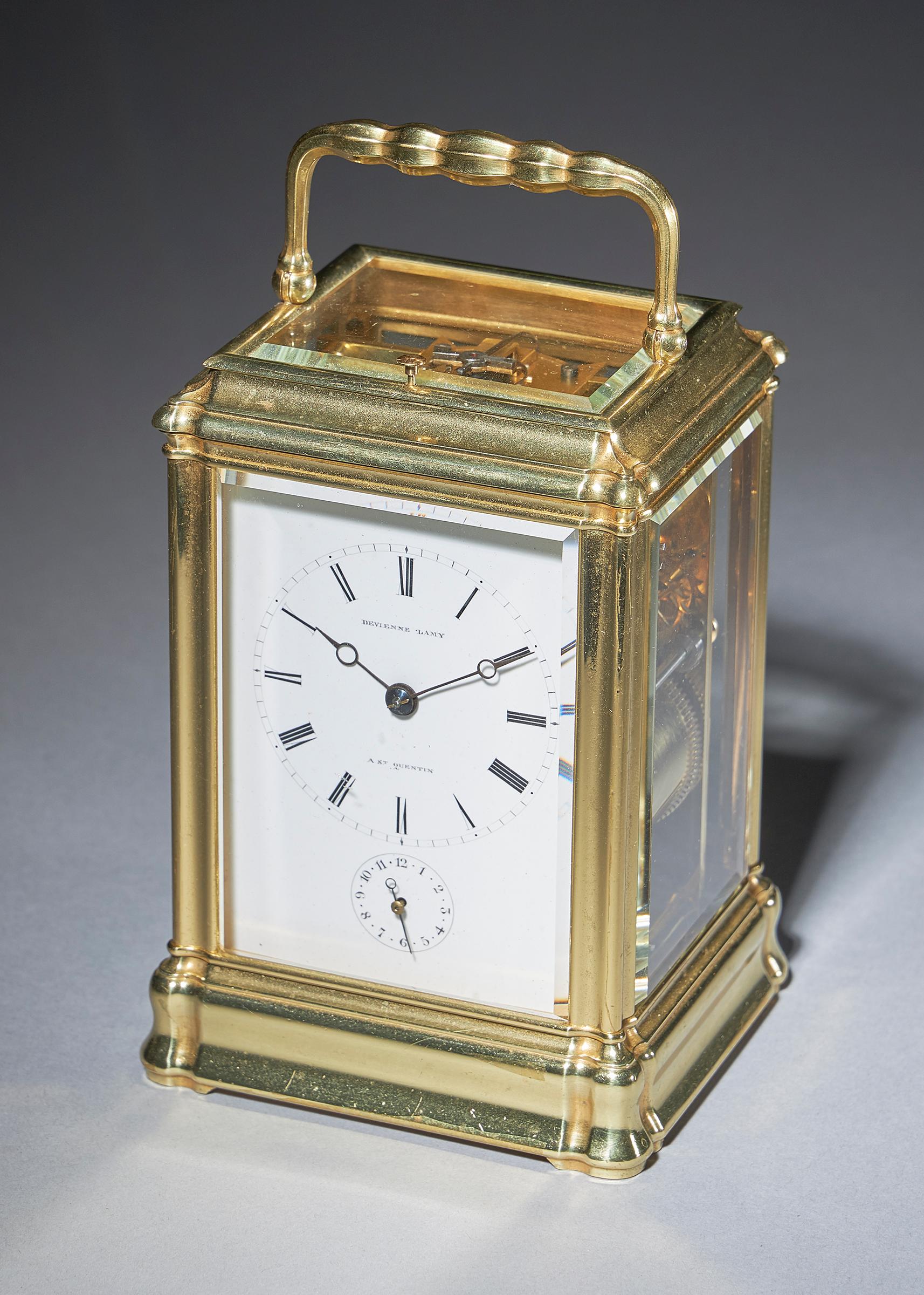 A rare and unusual 19th century carriage clock signed DEVIENNE LAMY A ST QUENTIN,
circa 1860



The gorge case has beveled glass panels on all sides so that the movement is entirely visible and is surmounted by a shaped carrying handle. The