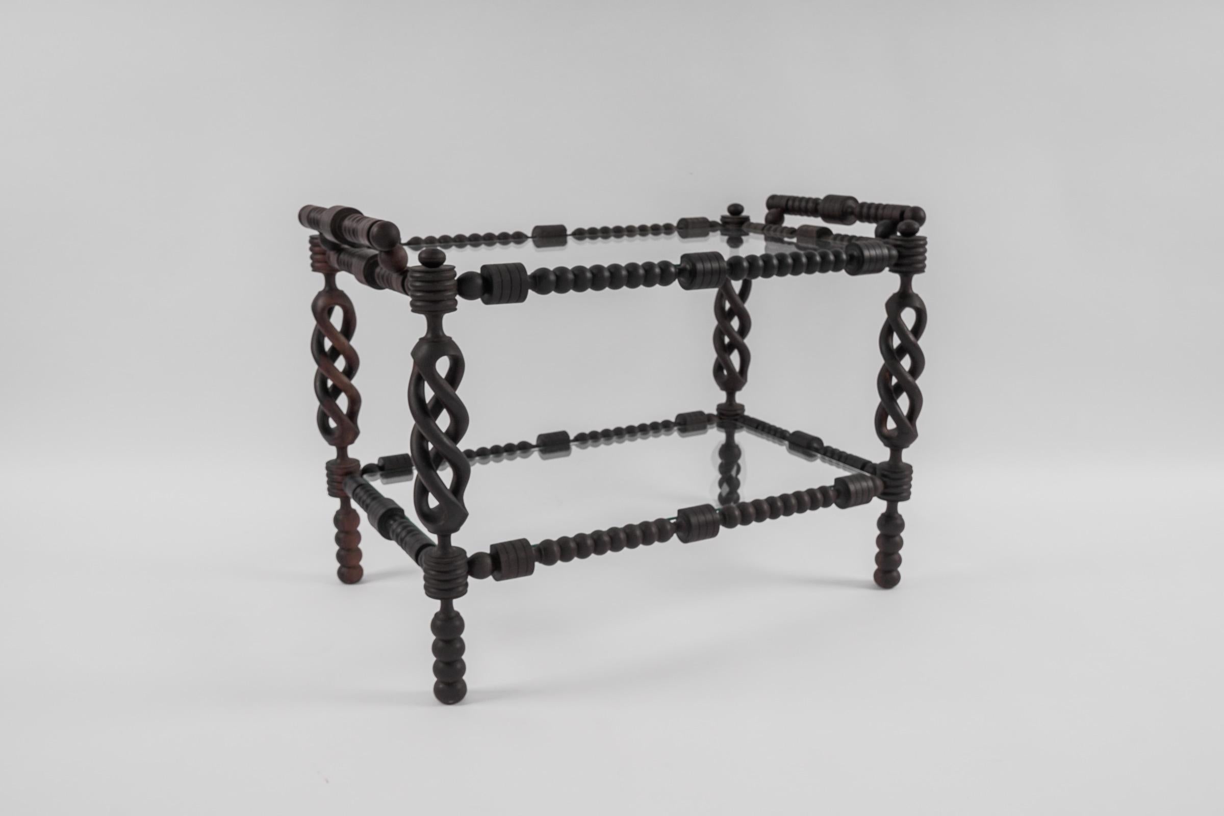 A rare and very decorative serving table from France with African influences. 

We love this serving table.
