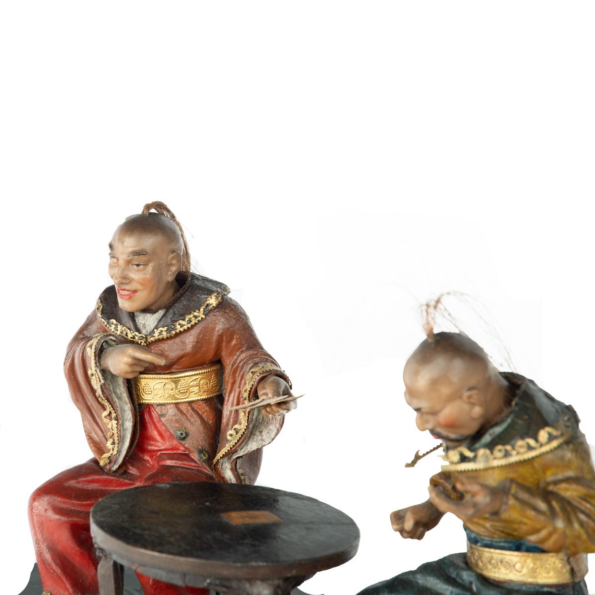A rare Anglo-Chinese Regency polychrome painted wax and wood group of two Chines In Good Condition For Sale In Lymington, Hampshire