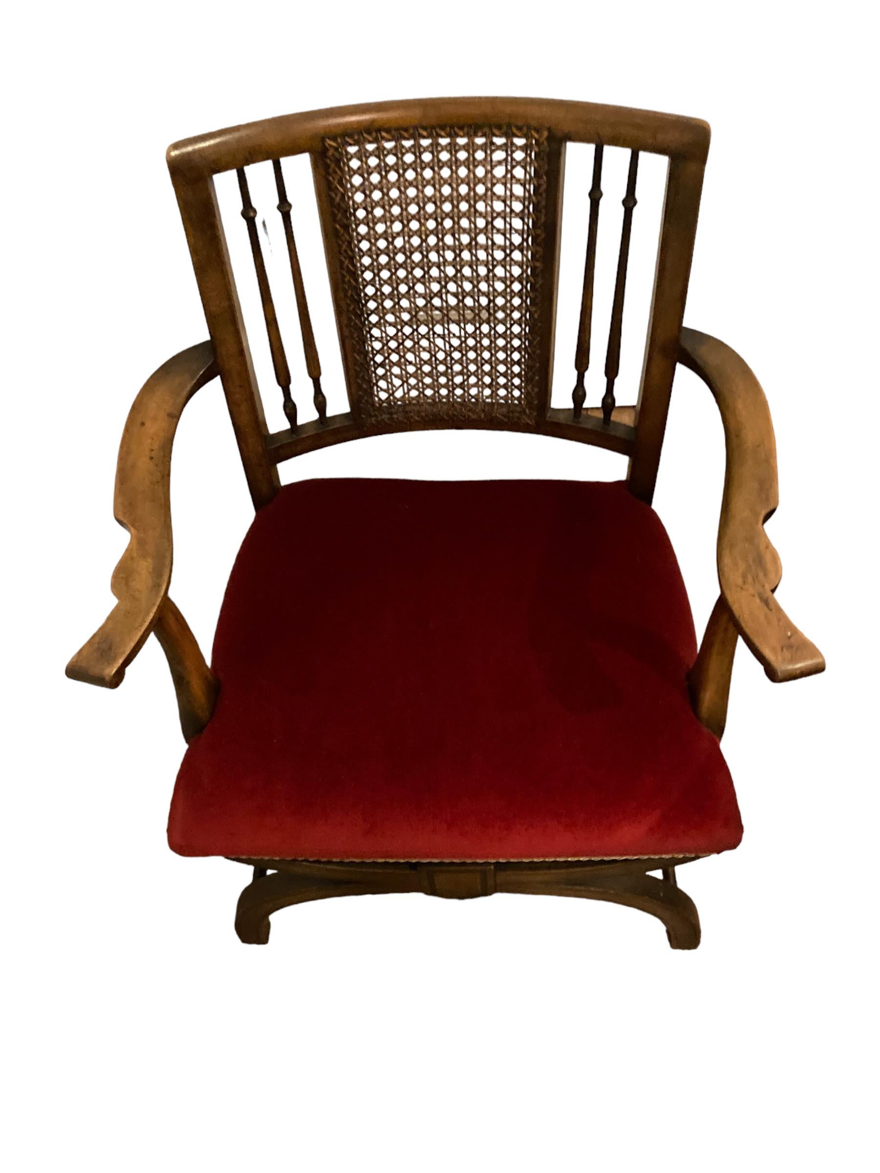 A rare Antique Beech Wood X Framed Cane back Arm chair For Sale 4