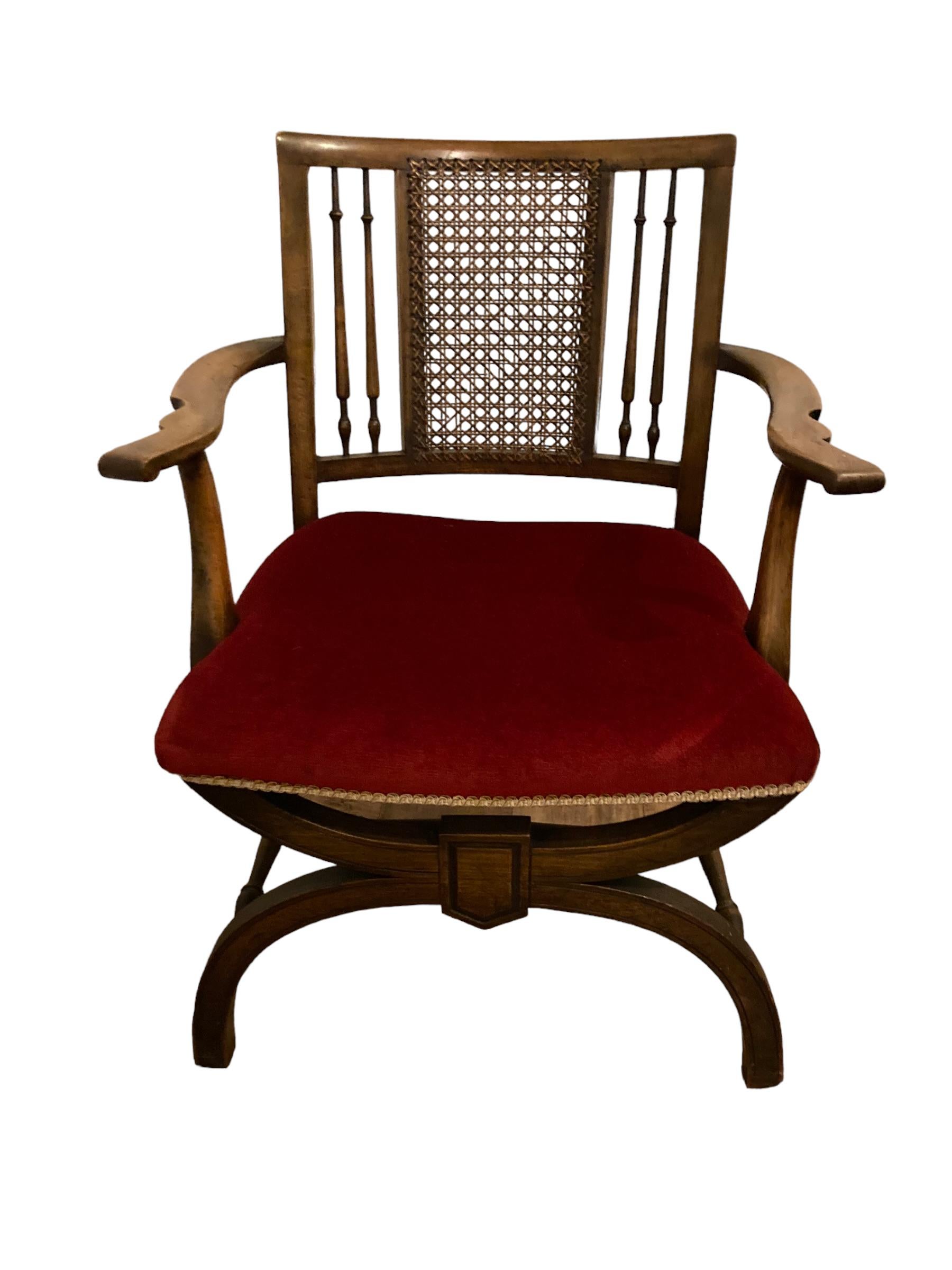 A rare Antique Beech Wood X Framed Cane back Arm chair For Sale 3