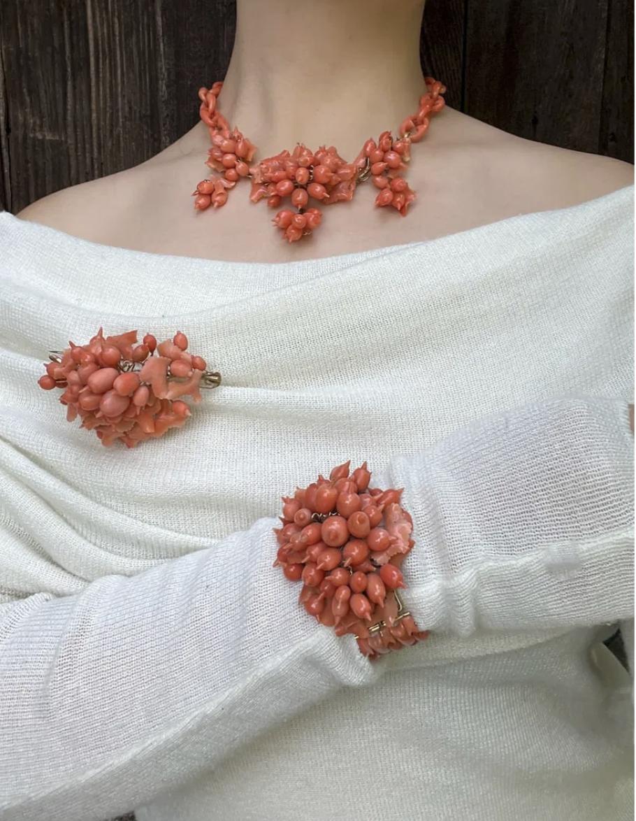 A Rare Antique Victorian Coral Parure - Coral Necklace, Bracelet & Brooch 

Approximate Dimensions:

Necklace:
42.5 cm (Unclasped Length)
1 cm - 6.5 cm (Width)
64.4 grams in weight.

Bracelet:
16.5 cm (Unclasped Length) 
2.4 cm - 5.5 cm(Width)
57.1