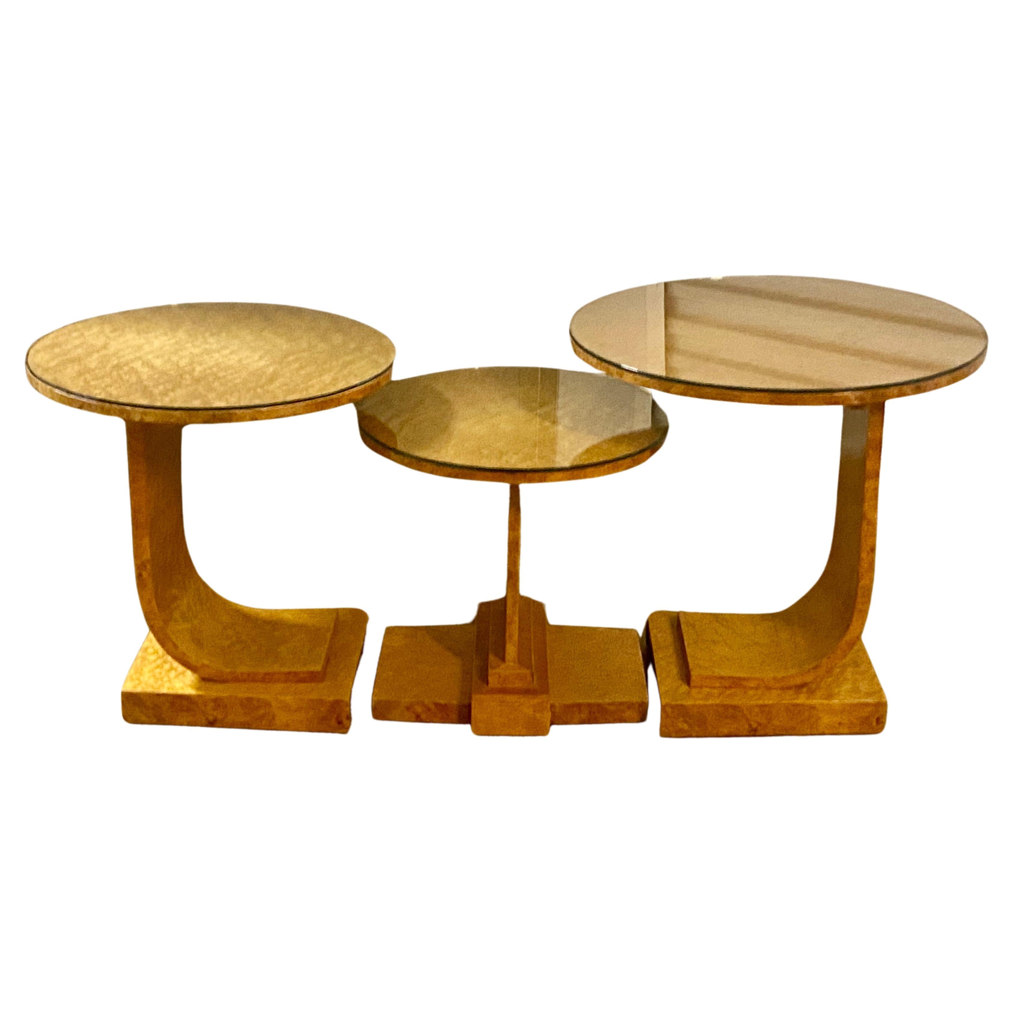 A Rare iconic J nest of tables finished in  birdseye maple veneer. 
Art Deco Blonde Burr Maple nest of 3 tables by H&L Epstein. This is widely considered as the rarest and most iconic Nesting Tables the brothers produced. This Classic art deco nest