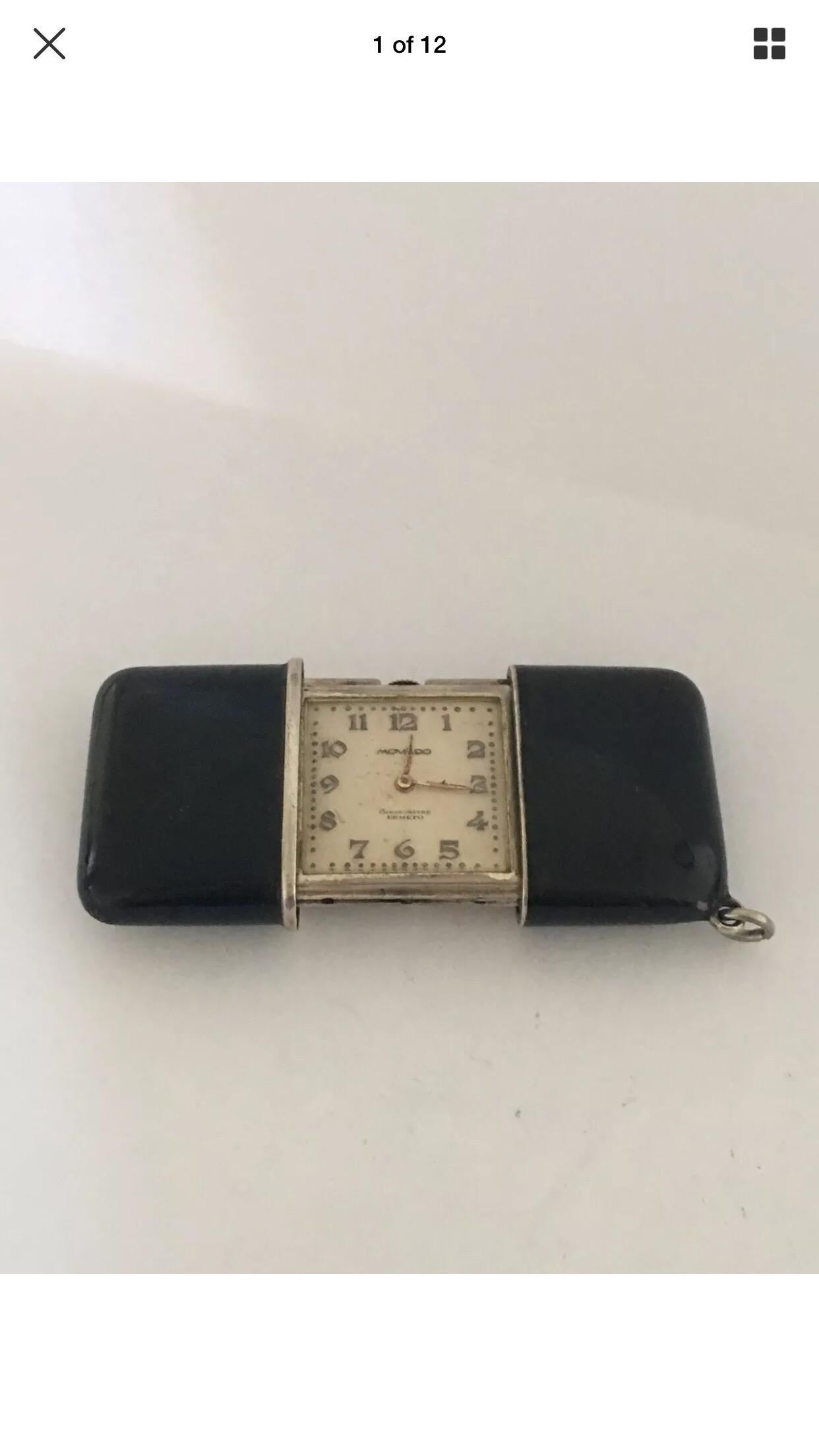 Black Enamel And Silver Movado Chronometre Ermeto Travel Clock.


This rare charming travel clock is in good working condition. Visible signs of ageing and wear wiht some visible chip on the enamel case as shown. Please study the images carefully as