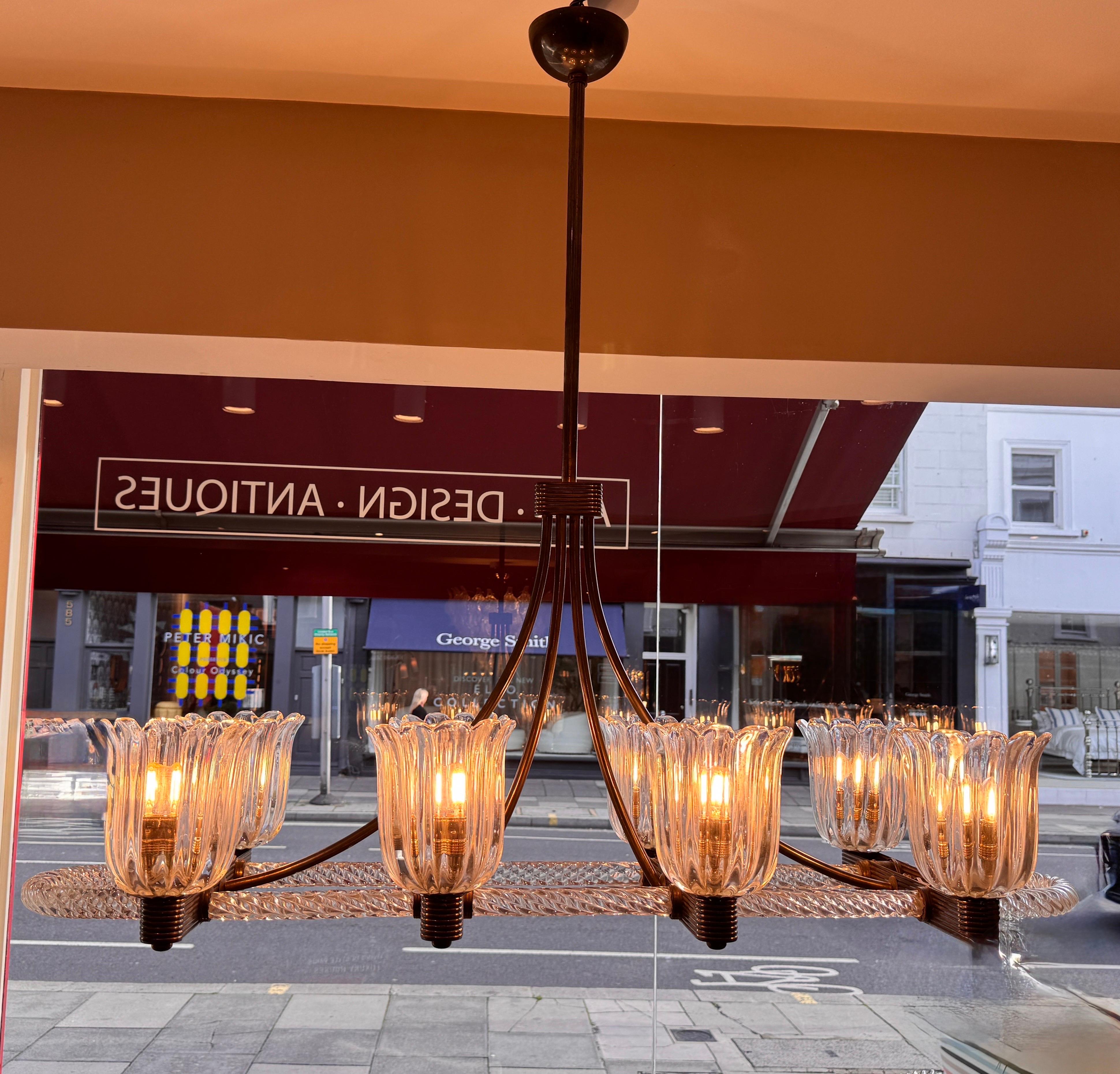 A rare brass mounted 8 arms horizontal chandelier by Ercole Barovier For Sale 2