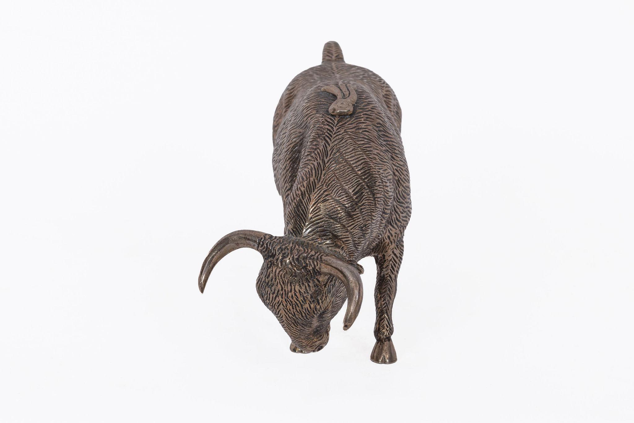 A Rare Buccellati Italy Sterling Silver Model of a Bull, Numbered 7

An impressive and finely detailed sterling silver model of a bull by Buccellati, Italy, numbered 7. Exquisitely hand-chased to capture the lifelike texture of the bull’s muscular