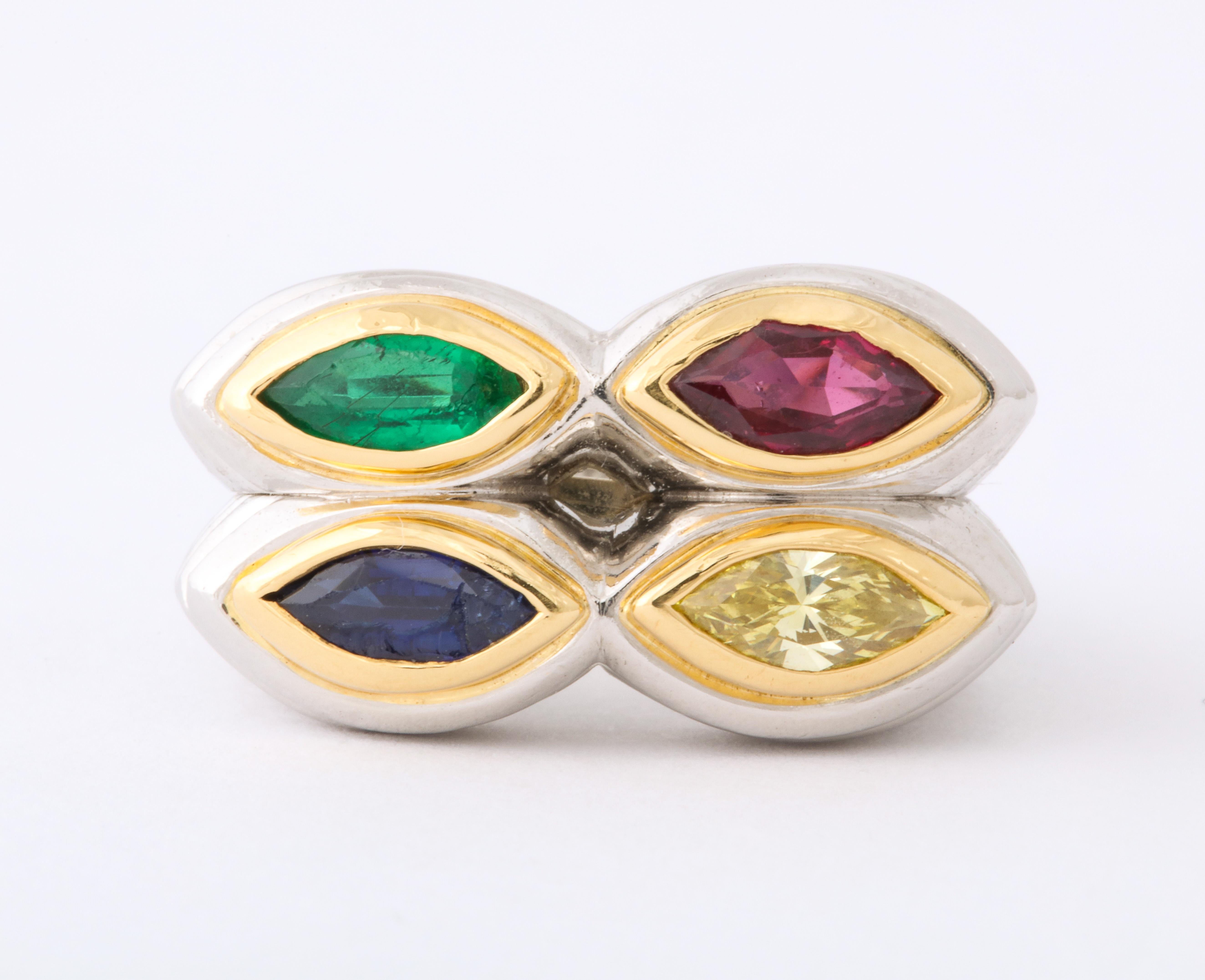A Rare Bulgari Platinum, Gold, Mulit-Gem and Yellow Diamond Ring.

Fabulous ring by Bvlgari, circa 1970s.

With Sapphires, Ruby, Emerlad, and Yellow Diamond. 

Signed and marked (see photos). 100% authentic guaranteed. 

Total weight 24 grams. 



