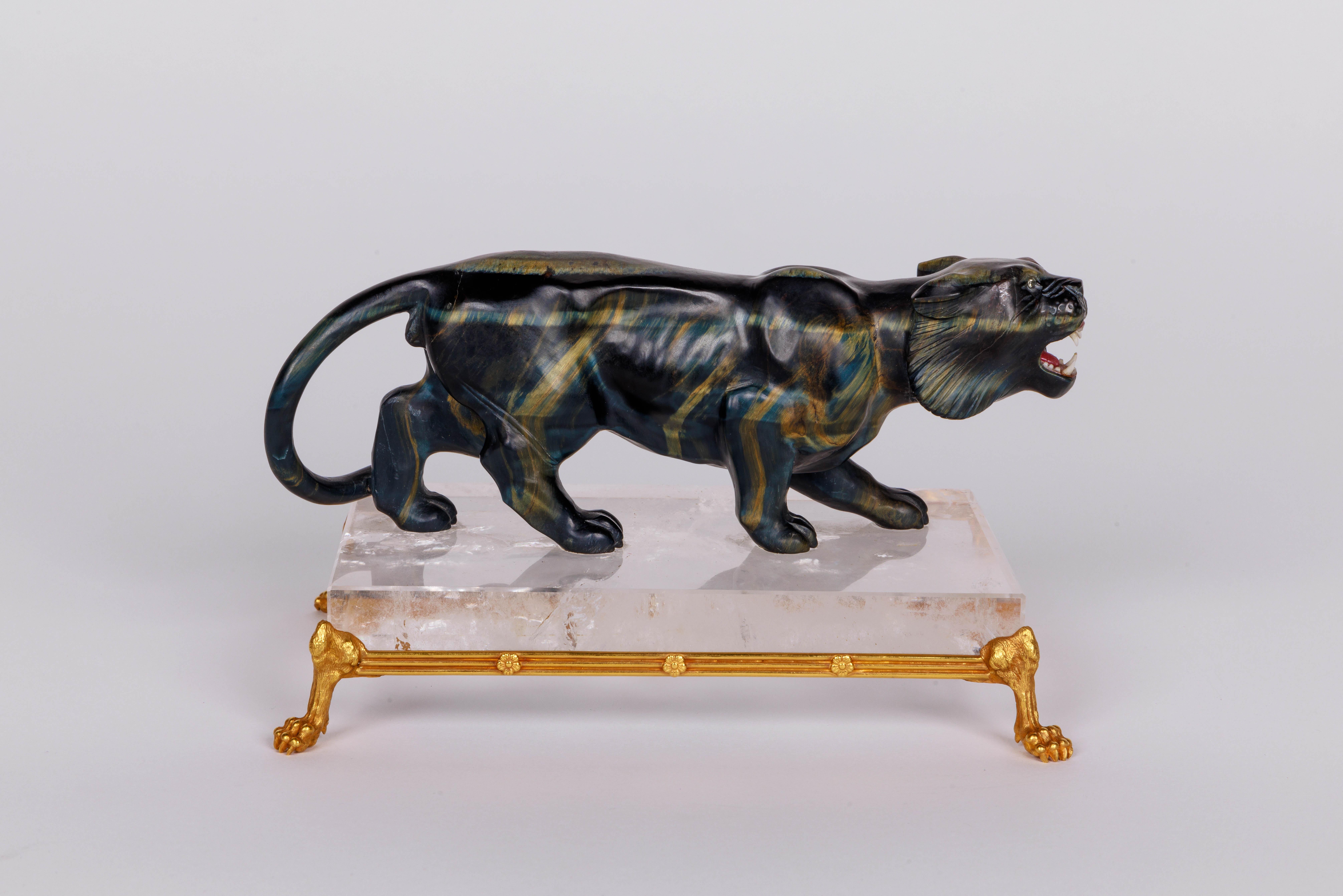 20th Century Rare Carved Hawk's Eye Agate Tiger on a 14K Gold Mounted Rock Crystal Base For Sale