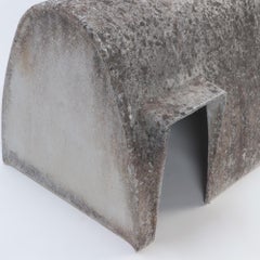 A rare cast stone Willy Guhl dog house circa 1970.