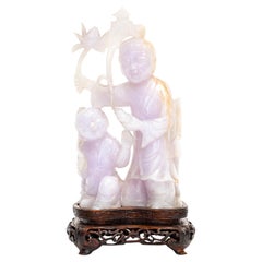 Una rara scultura cinese in giadeite color lavanda pallido raffigurante due immortali