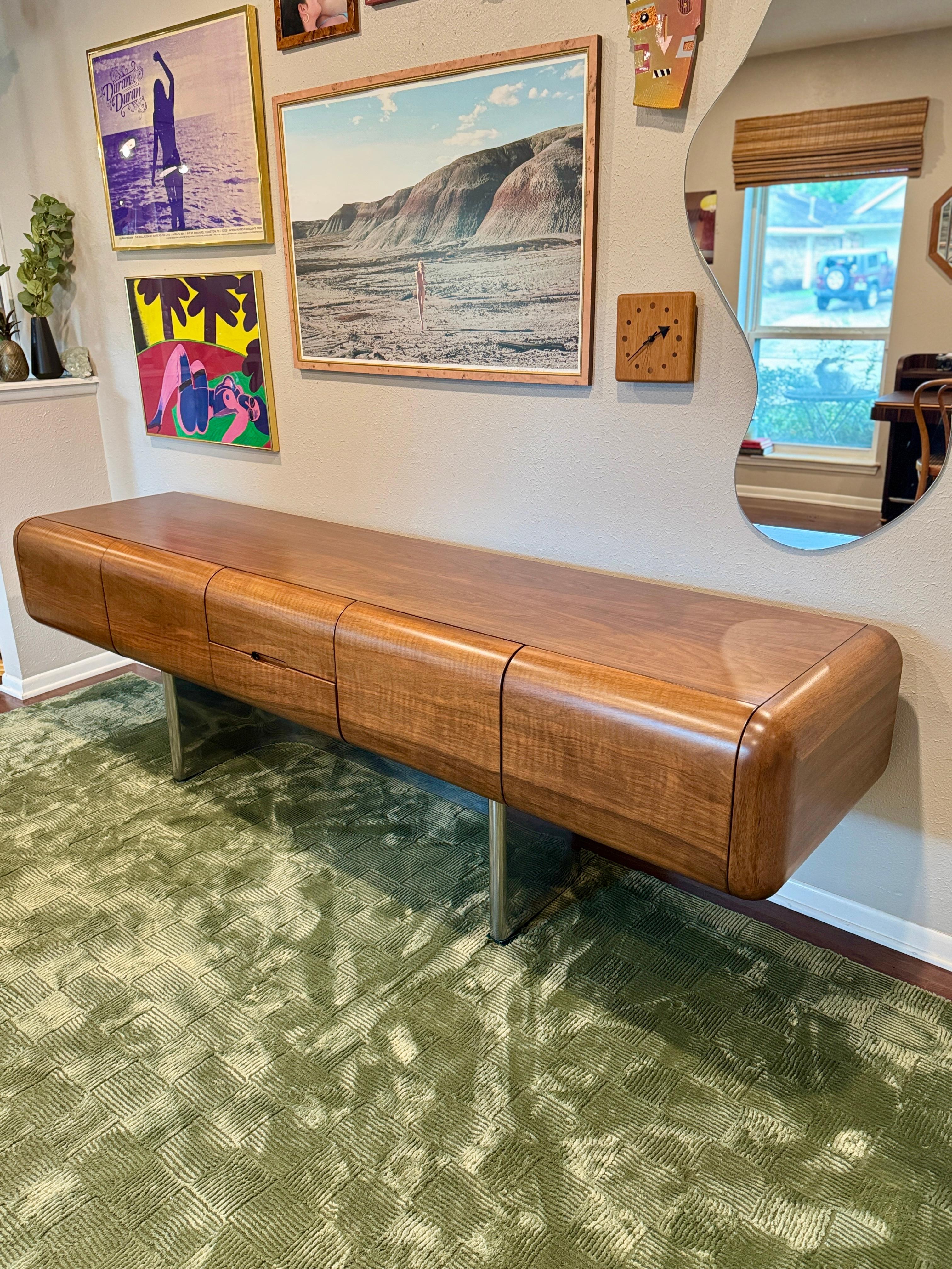 An incredibly rare executive credenza designed by M.F. Harty for Stow Davis as part of the 1974 “Tomorrow” collection—produced in extremely limited numbers, with only around 30 made. Beautifully restored and in great condition. With vivid walnut