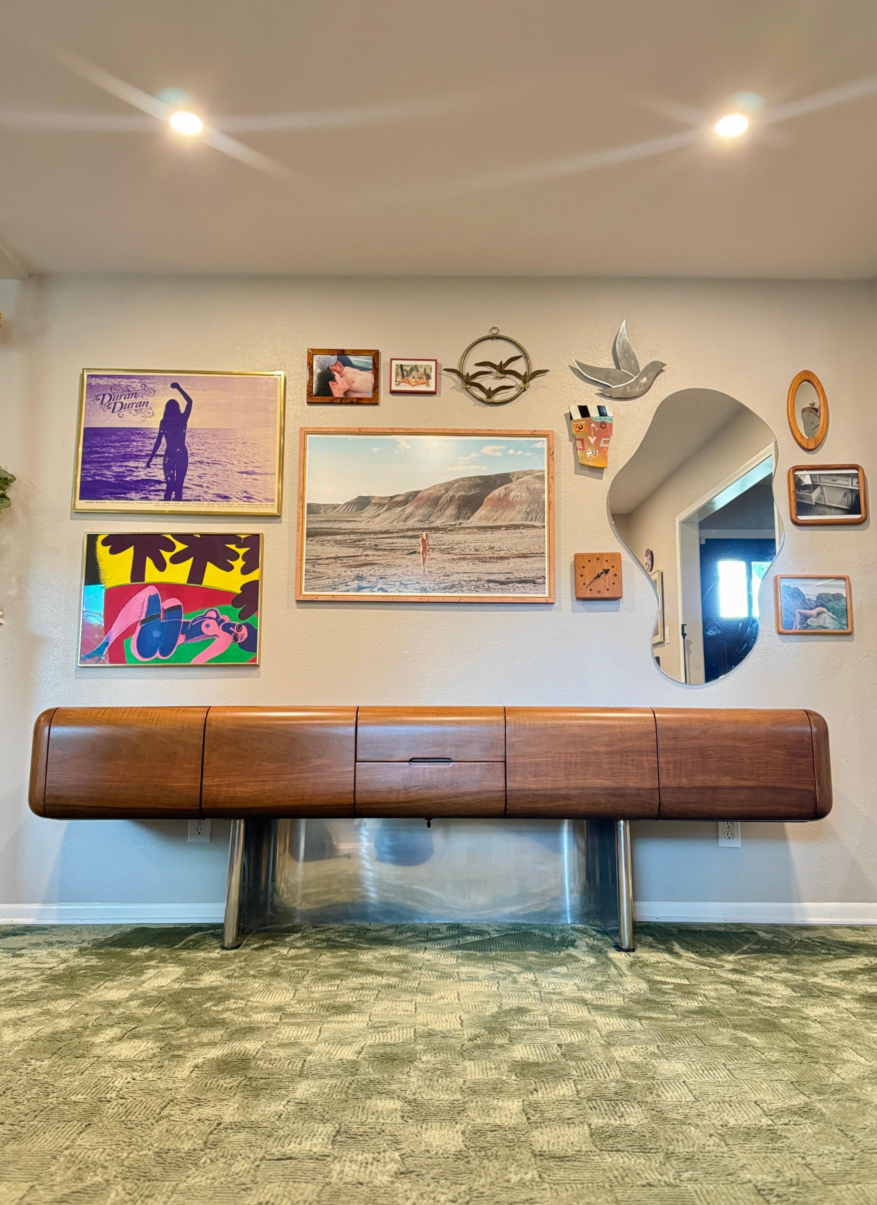 A rare chrome and walnut executive credenza by M.F. Harty for Stow Davis In Good Condition For Sale In Houston, TX