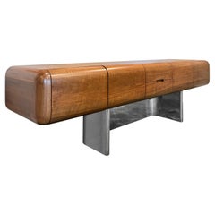 A rare chrome and walnut executive credenza by M.F. Harty for Stow Davis